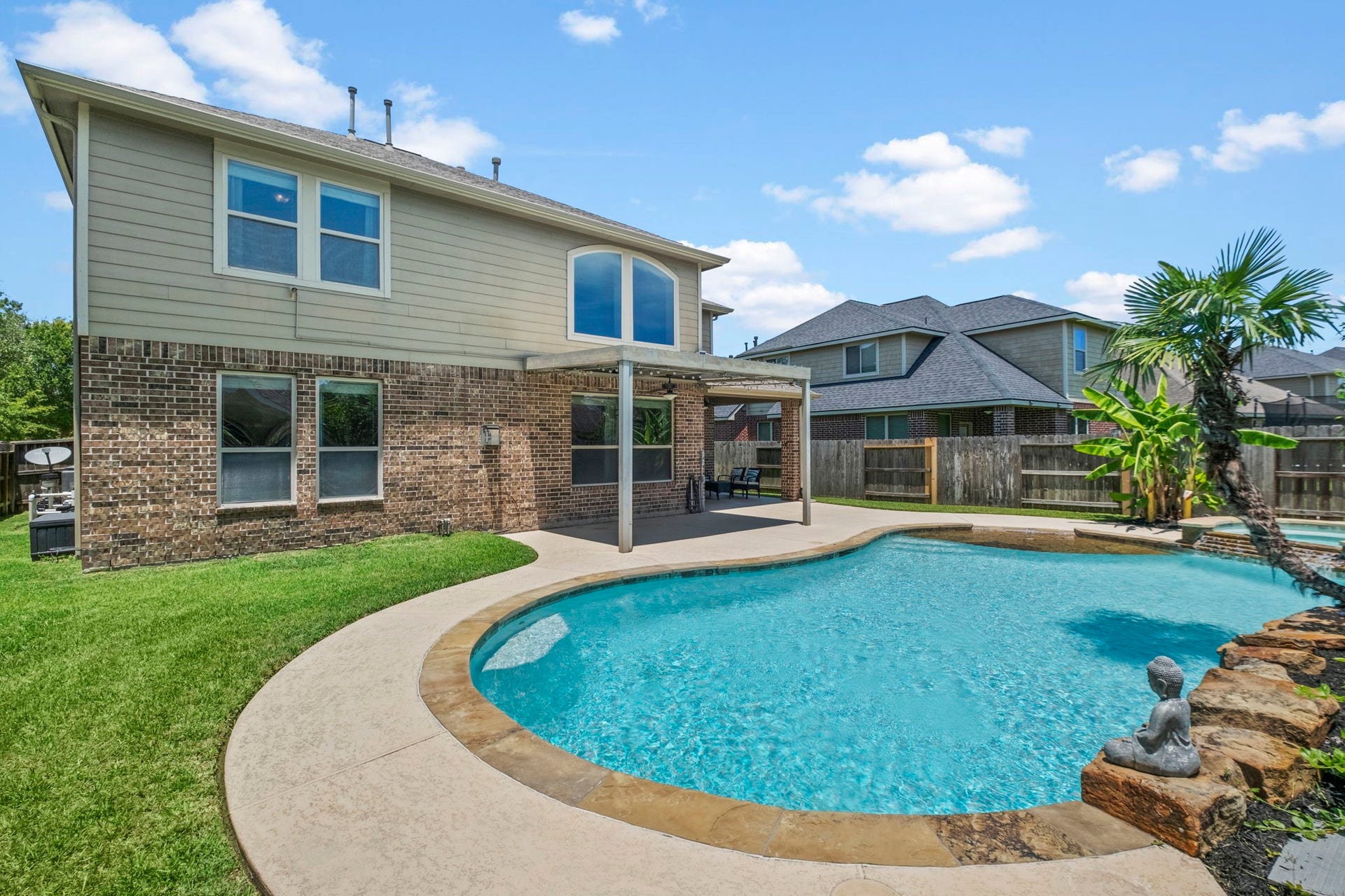 19519 Arbor Lodge Drive, Cypress, TX 77433 The backyard provides extra green space even with the pool!
