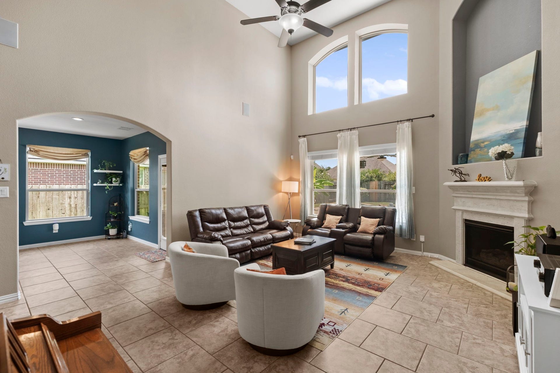 19519 Arbor Lodge Drive, Cypress, TX 77433 Soaring ceilings in this beautiful living room which flows right into the breakfast area.