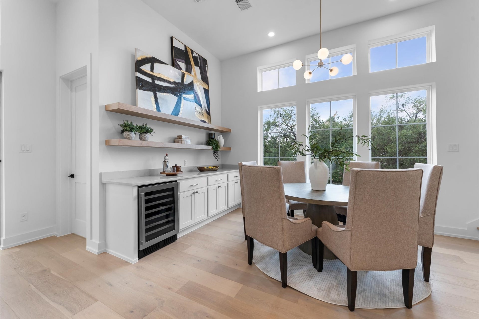 2926 Michaux Street, Houston, TX 77009 Second floor dining area features a bar with open shelves, wine fridge and plenty of storage.