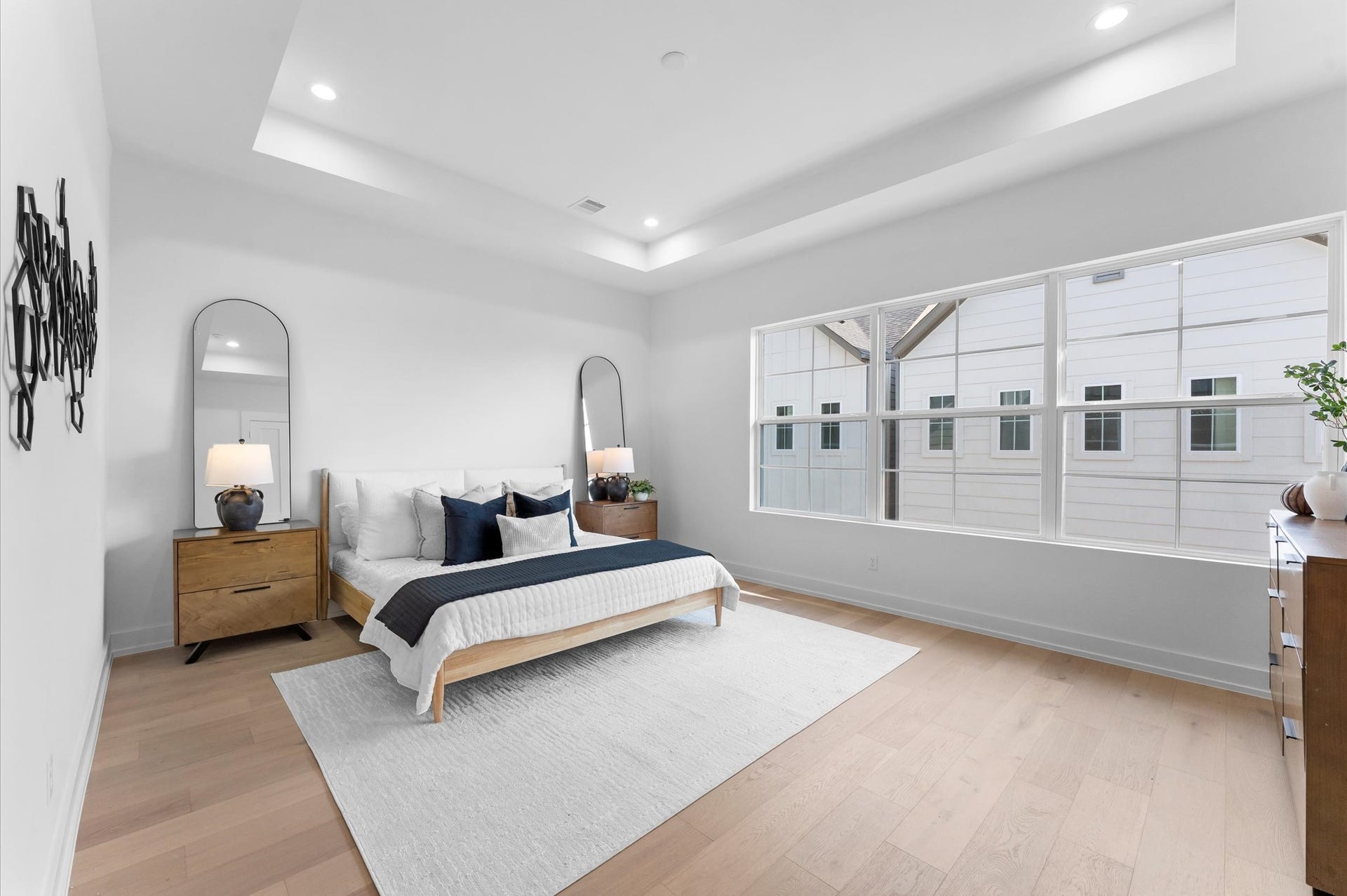 2926 Michaux Street, Houston, TX 77009 Oversized primary bedroom with tray ceiling is located on the third floor.