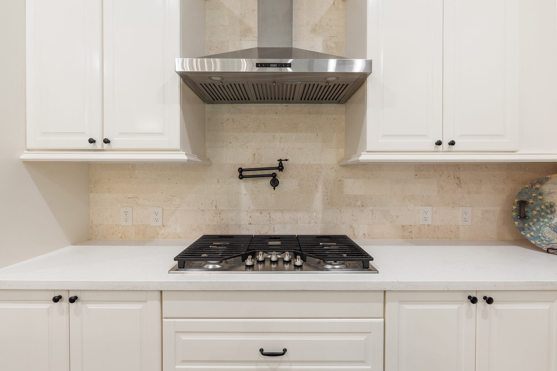 12134 S Tara Plantation Drive, Tomball, TX 77375 Gas cooktop, hood and pot-filler.