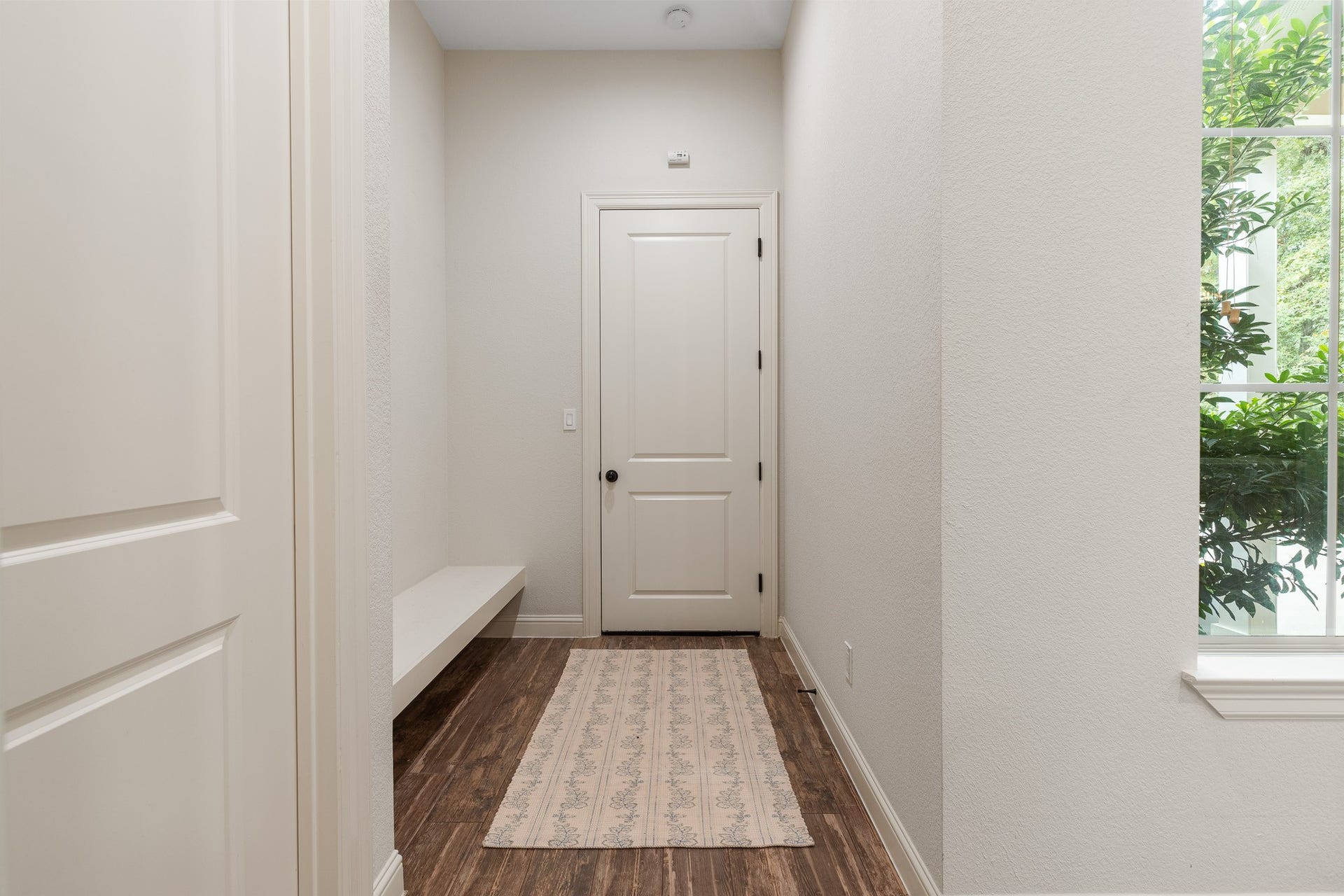 12134 S Tara Plantation Drive, Tomball, TX 77375 Mud room off of garage, spray foam insulation installed in the attic, significantly improving energy efficiency, temperature regulation and overall comfort.