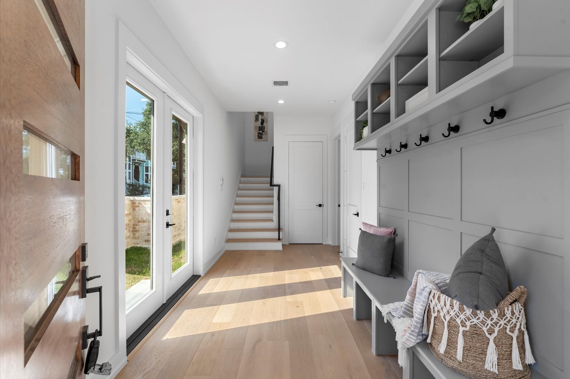 Mud room upon entry is both functional and beautiful.