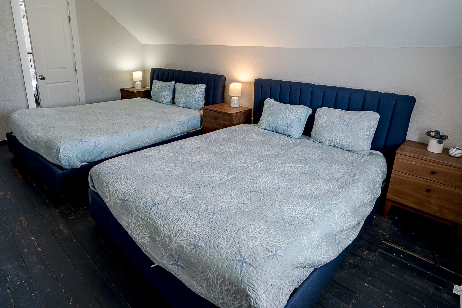 2511 Avenue L, Galveston, TX 77550 Second floor half story features two queen beds