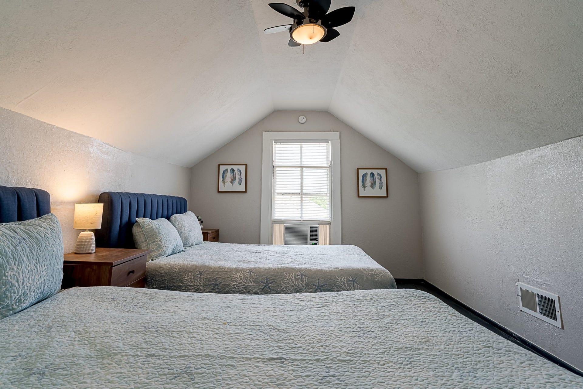 2511 Avenue L, Galveston, TX 77550 Second floor half story features two queen beds