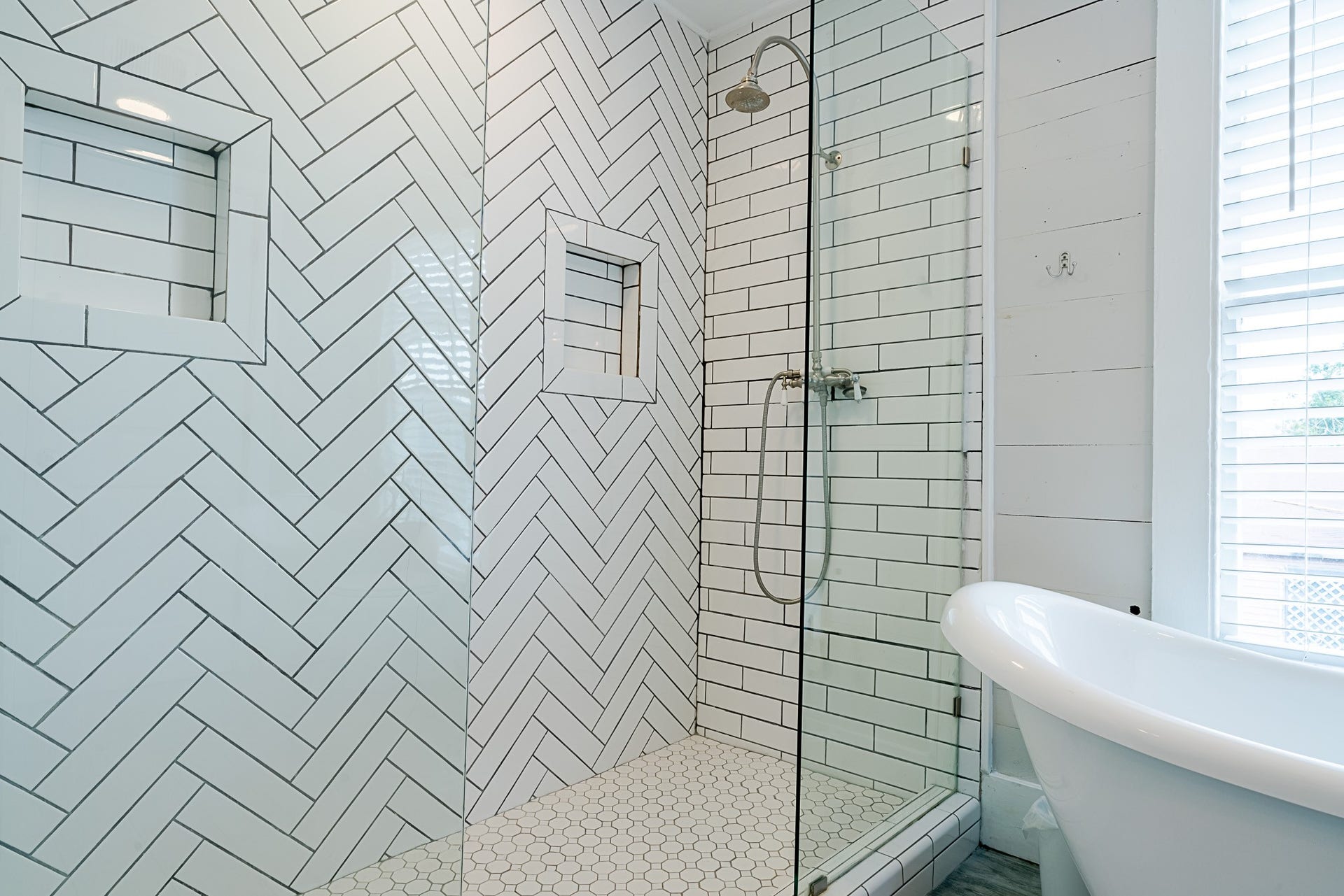 2511 Avenue L, Galveston, TX 77550 Beautifully upgraded primary bathroom with fully tiled stand alone shower