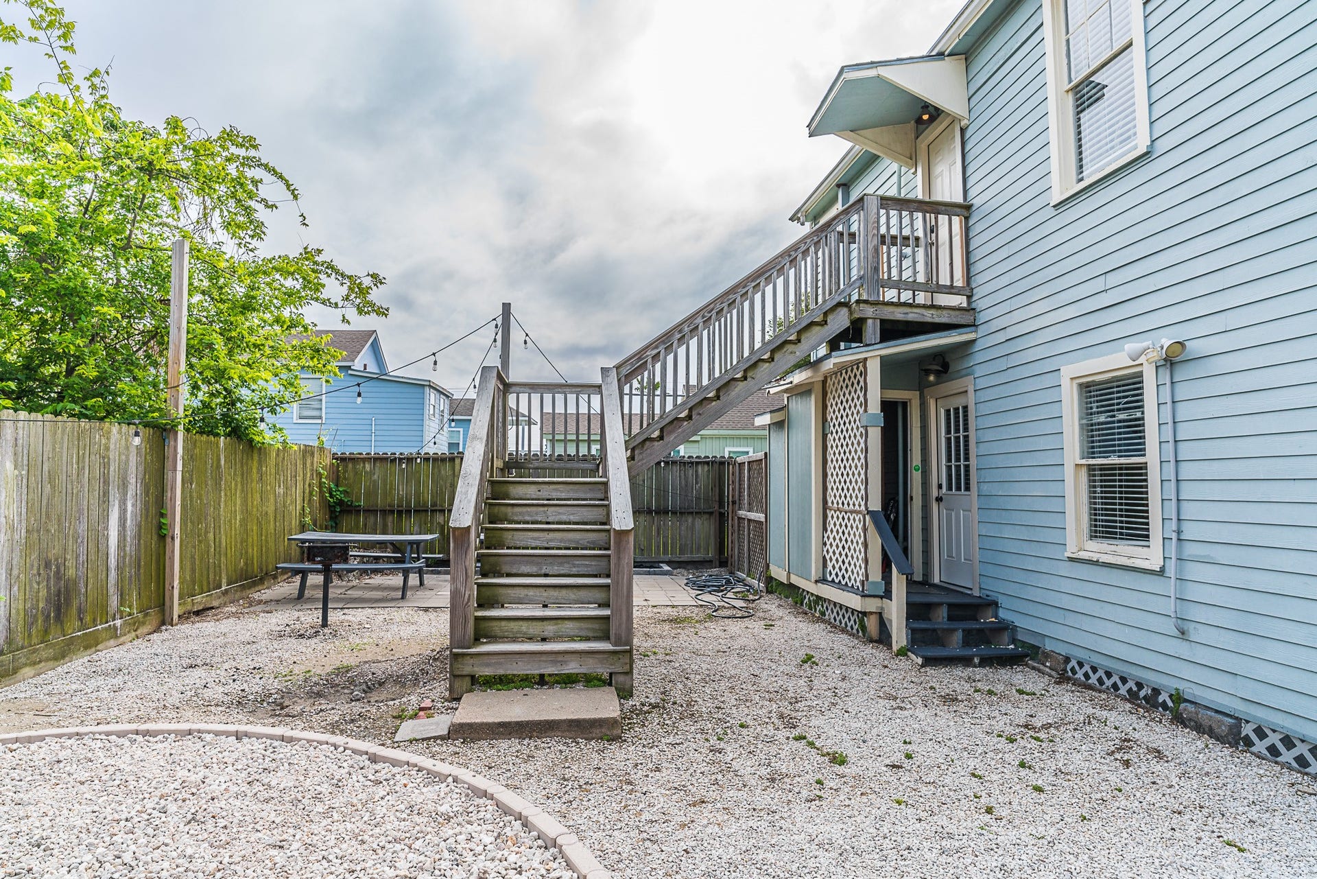 2511 Avenue L, Galveston, TX 77550 Backside staircase for entry into second floor rental