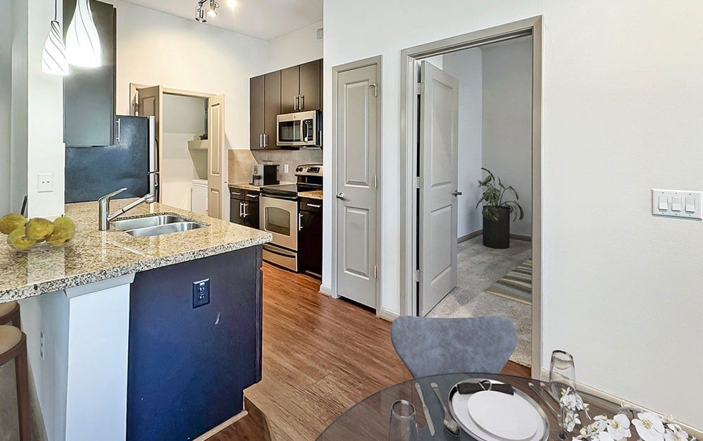 306 McGowen Street, #3306, Houston, TX 77006 Whether you're preparing a leisurely breakfast or hosting dinner for friends, this thoughtfully arranged kitchen makes everyday living a pleasure. Granite countertops, rich cabinetry, stainless steel appliances and a welcoming dining area bring together style, warmth and convenience.