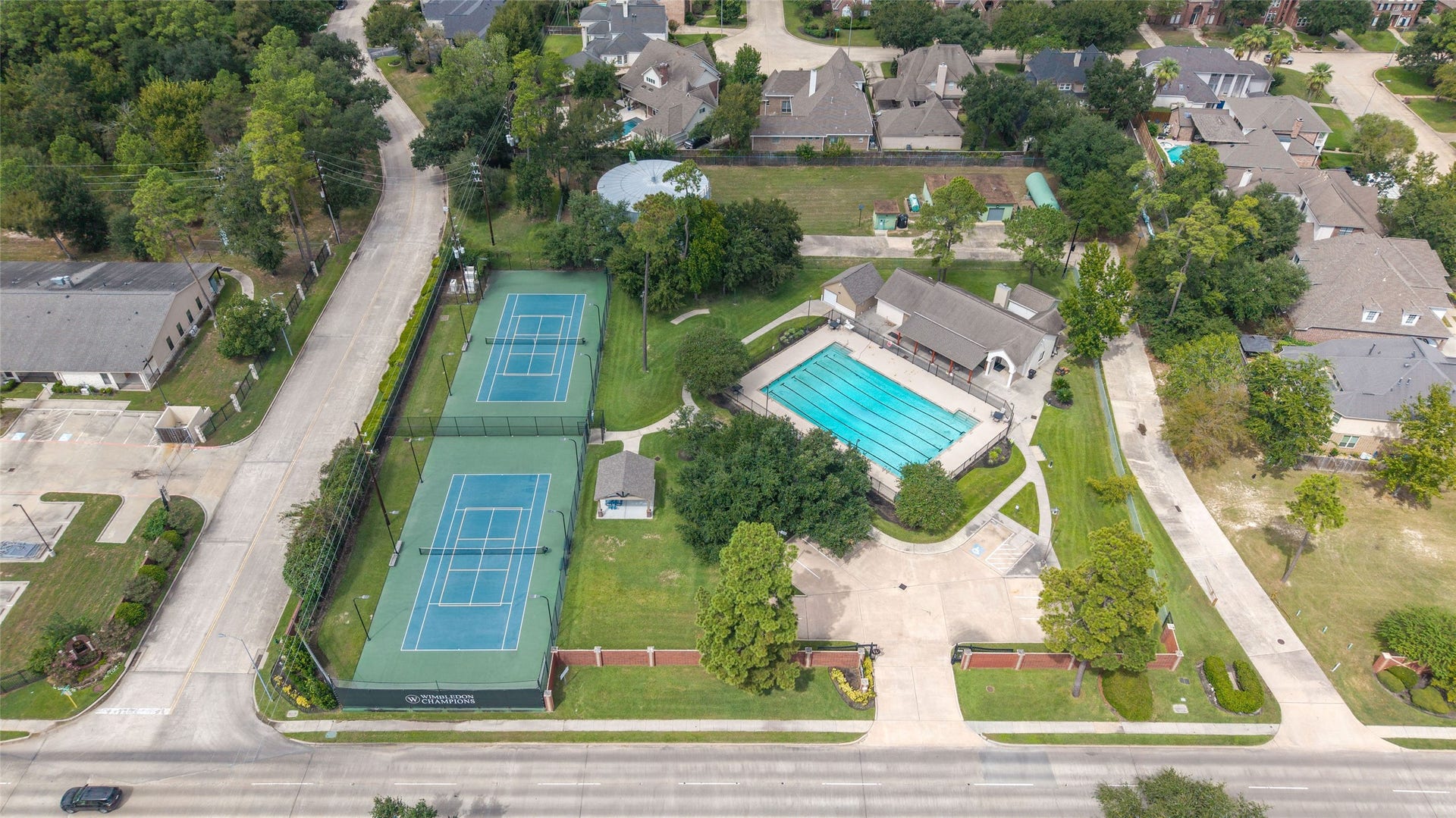 16114 Lafone Drive, Spring, TX 77379 Two tennis courts and a large pool are a few of the amenities offered to Wimbledon Forest residents.