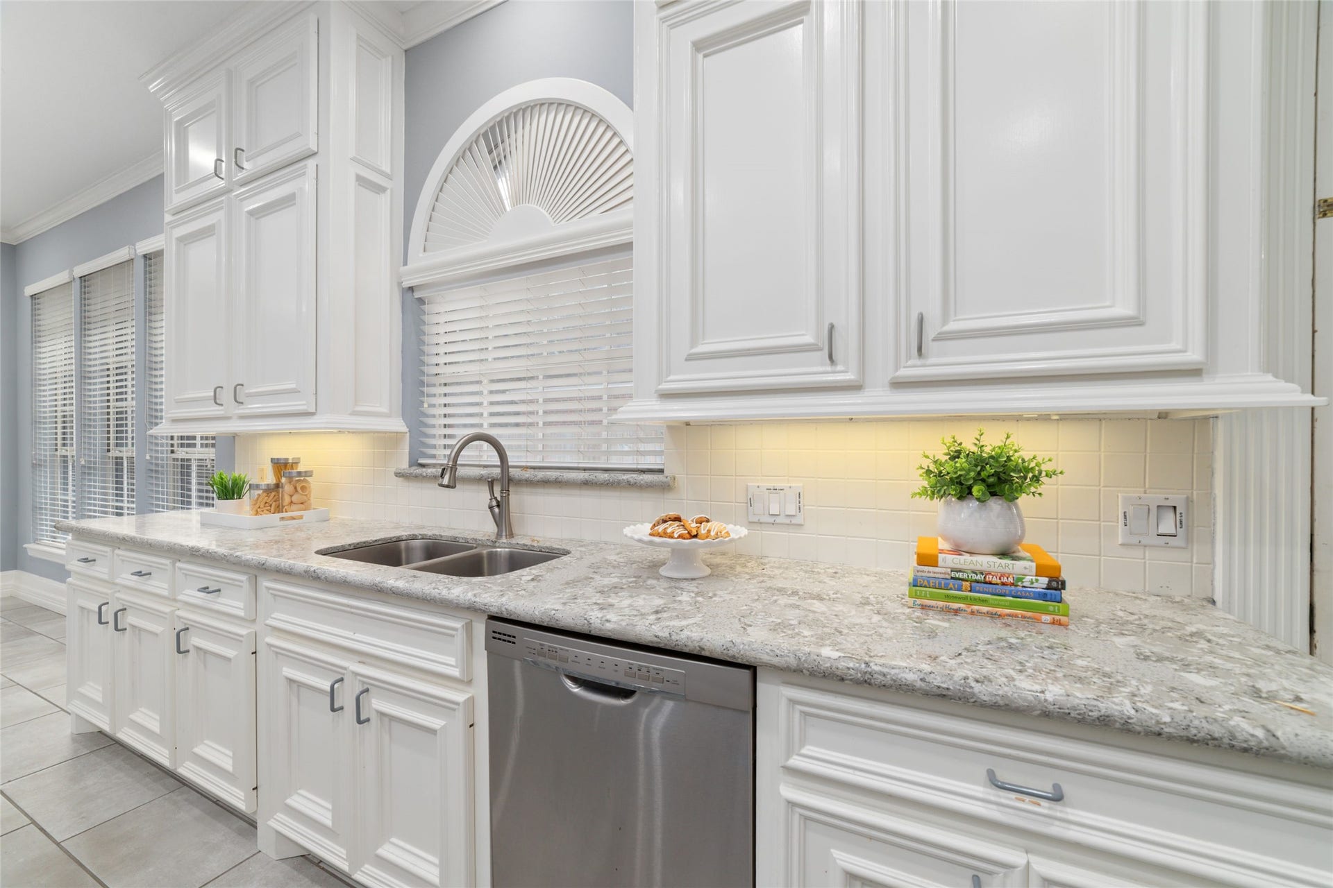 16114 Lafone Drive, Spring, TX 77379 Beautiful cabinetry and expansive granite countertops provide plenty of workspace and storage.