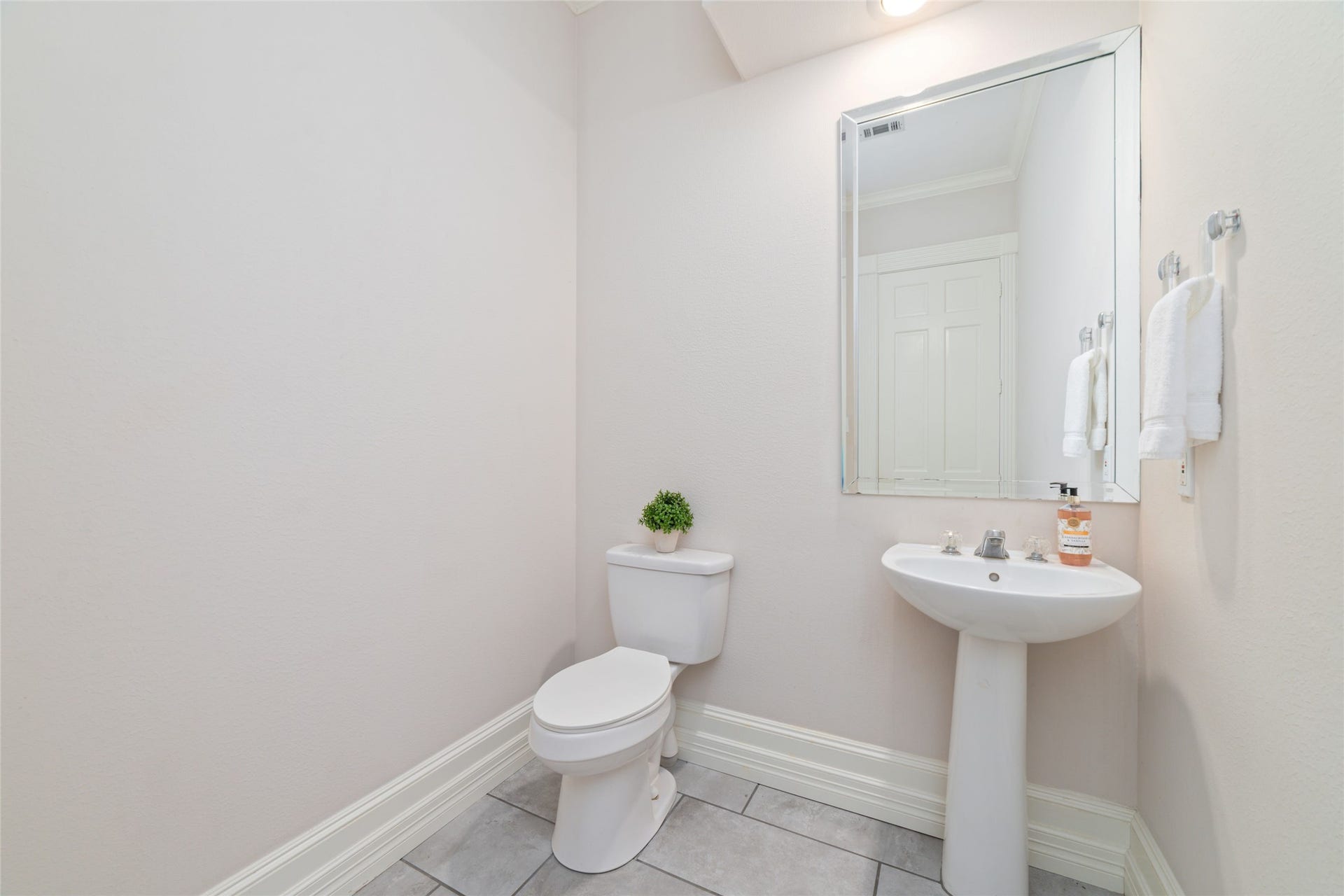 16114 Lafone Drive, Spring, TX 77379 Convenient downstairs powder room is tucked away just off the main living areas for guests.