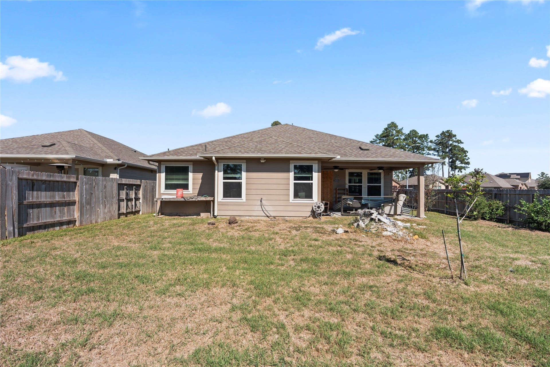 12805 S Winding Pines Drive, Tomball, TX 77375 The large backyard is an open canvas for a new owner.