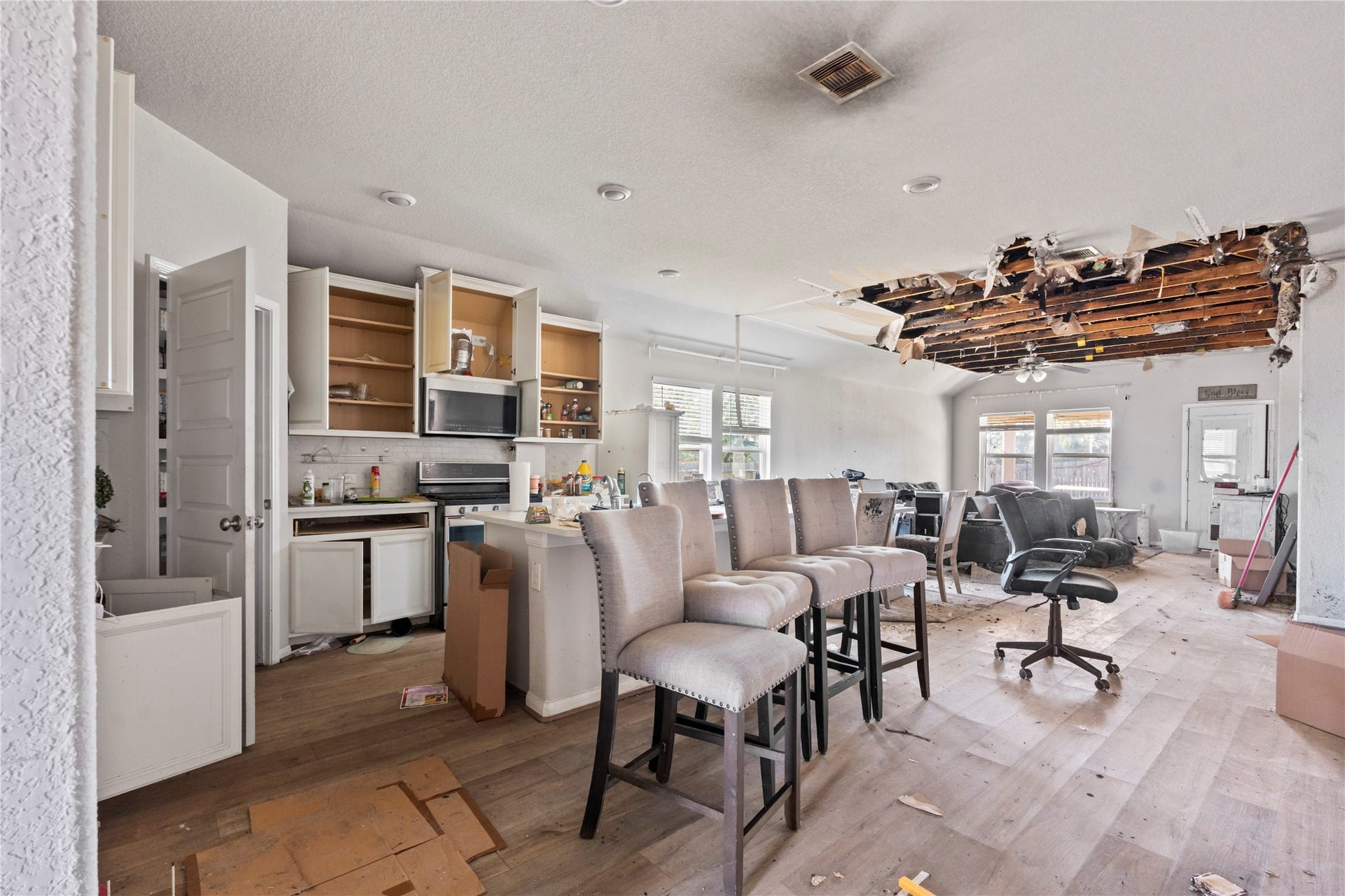 12805 S Winding Pines Drive, Tomball, TX 77375 This kitchen and family room can't wait to be renovated and rebuilt.