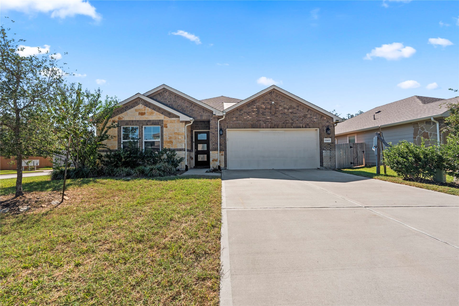 12805 S Winding Pines Drive, Tomball, TX 77375 The fire damage didn't damper the curb appeal of this adorable one story home.
