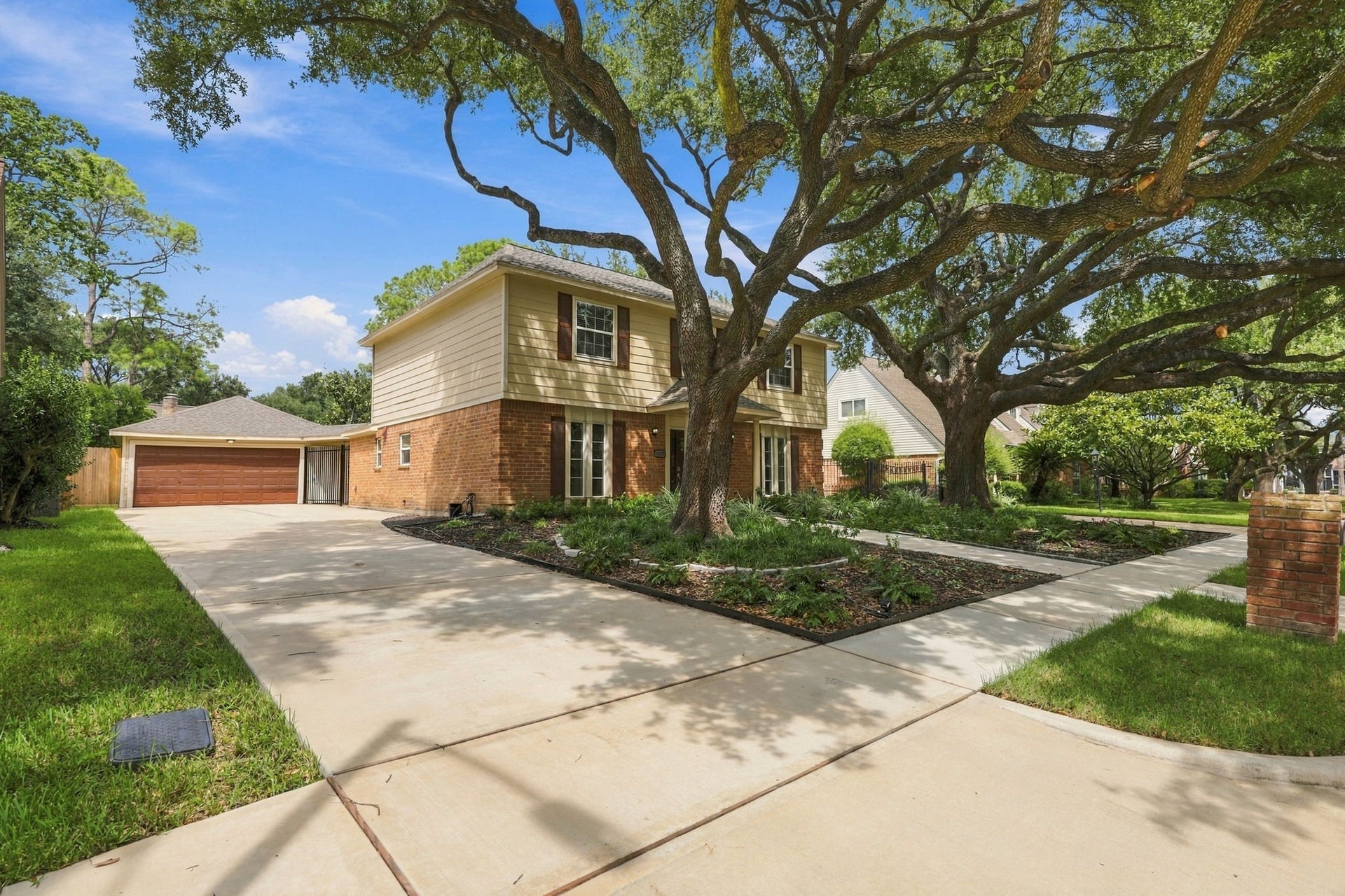 11310 Olympia Drive, Houston, TX 77077 View of the new driveway and spacious garage.