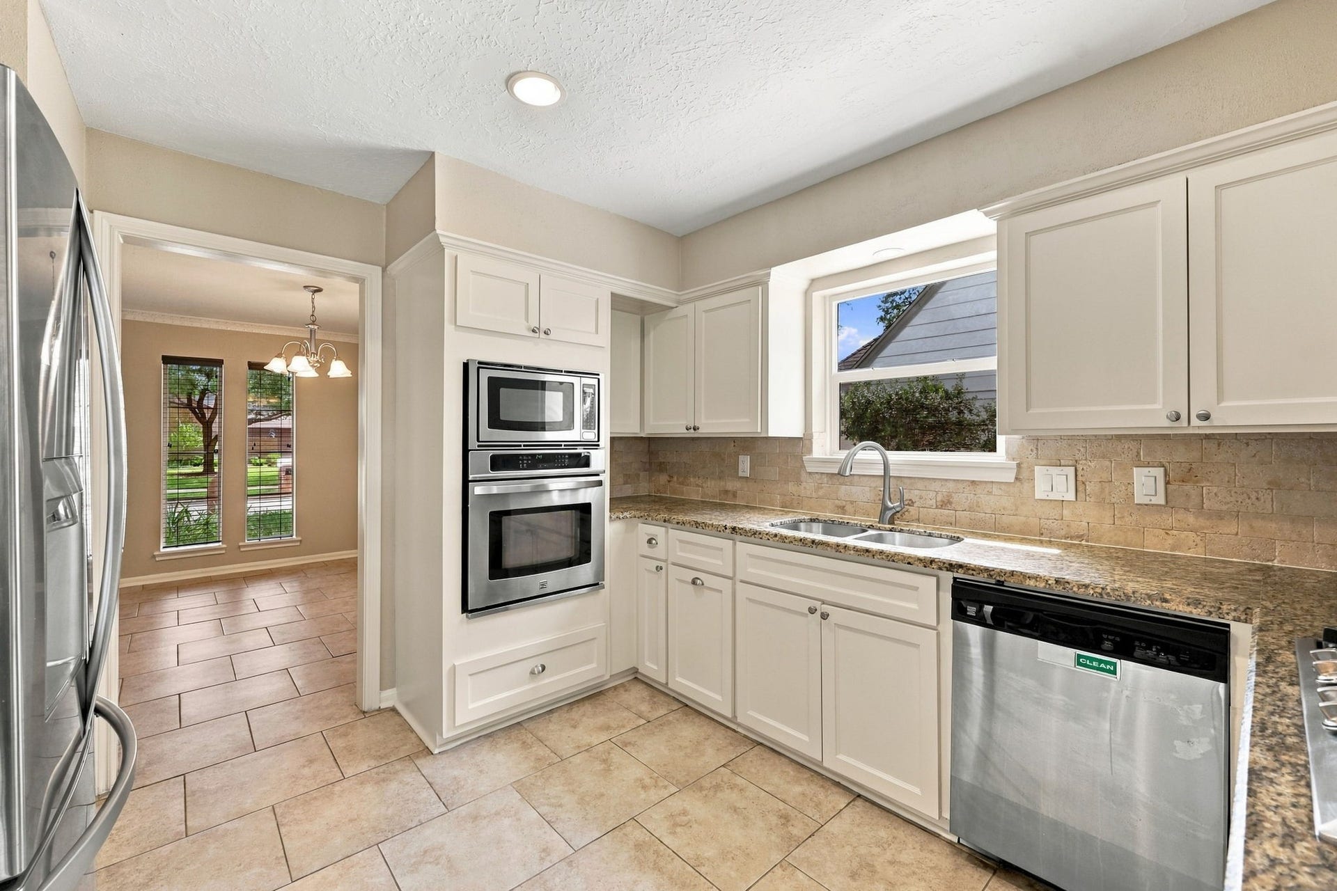 11310 Olympia Drive, Houston, TX 77077 Kitchen open to the Dining Room.