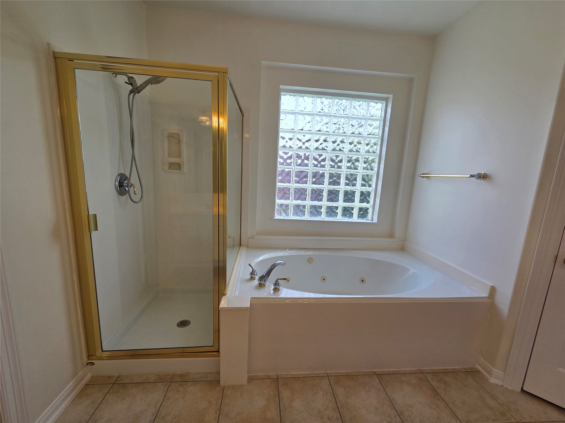 1313 Romero Drive, Pearland, TX 77581 Master Bathroom with standing shower and a tub