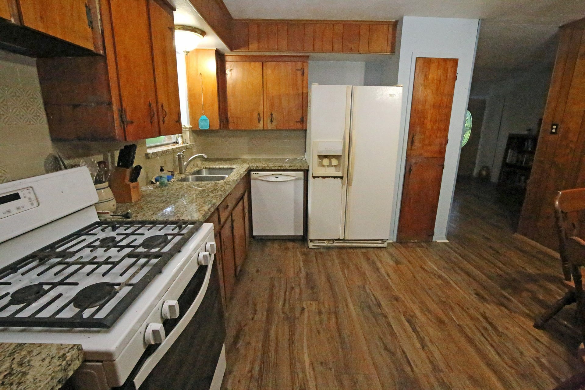 13502 30th Street, Santa Fe, TX 77510 Kitchen with gas stove and refrigerator stays
