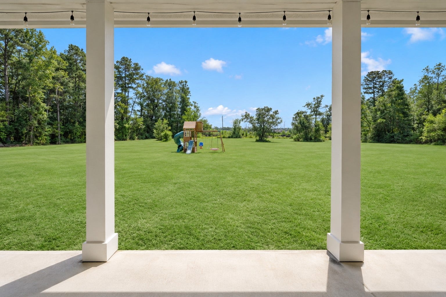 22694 Brook Forest Road, New Caney, TX 77357 THIS VIEW! Step onto the covered patio and look out across your expansive backyard.