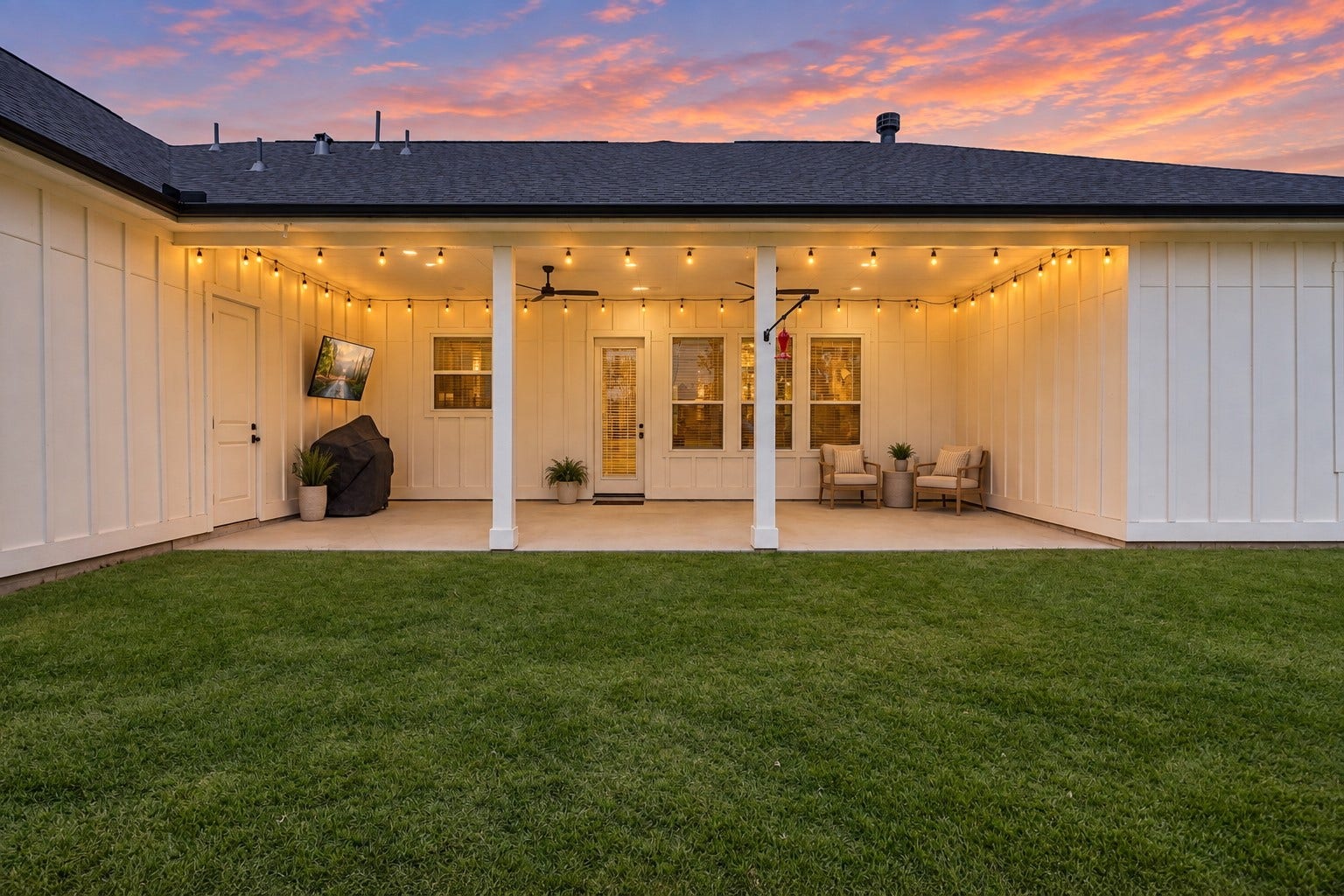 22694 Brook Forest Road, New Caney, TX 77357 Covered back patio with ceiling fans, lighting & plenty of room for outdoor living and entertaining.