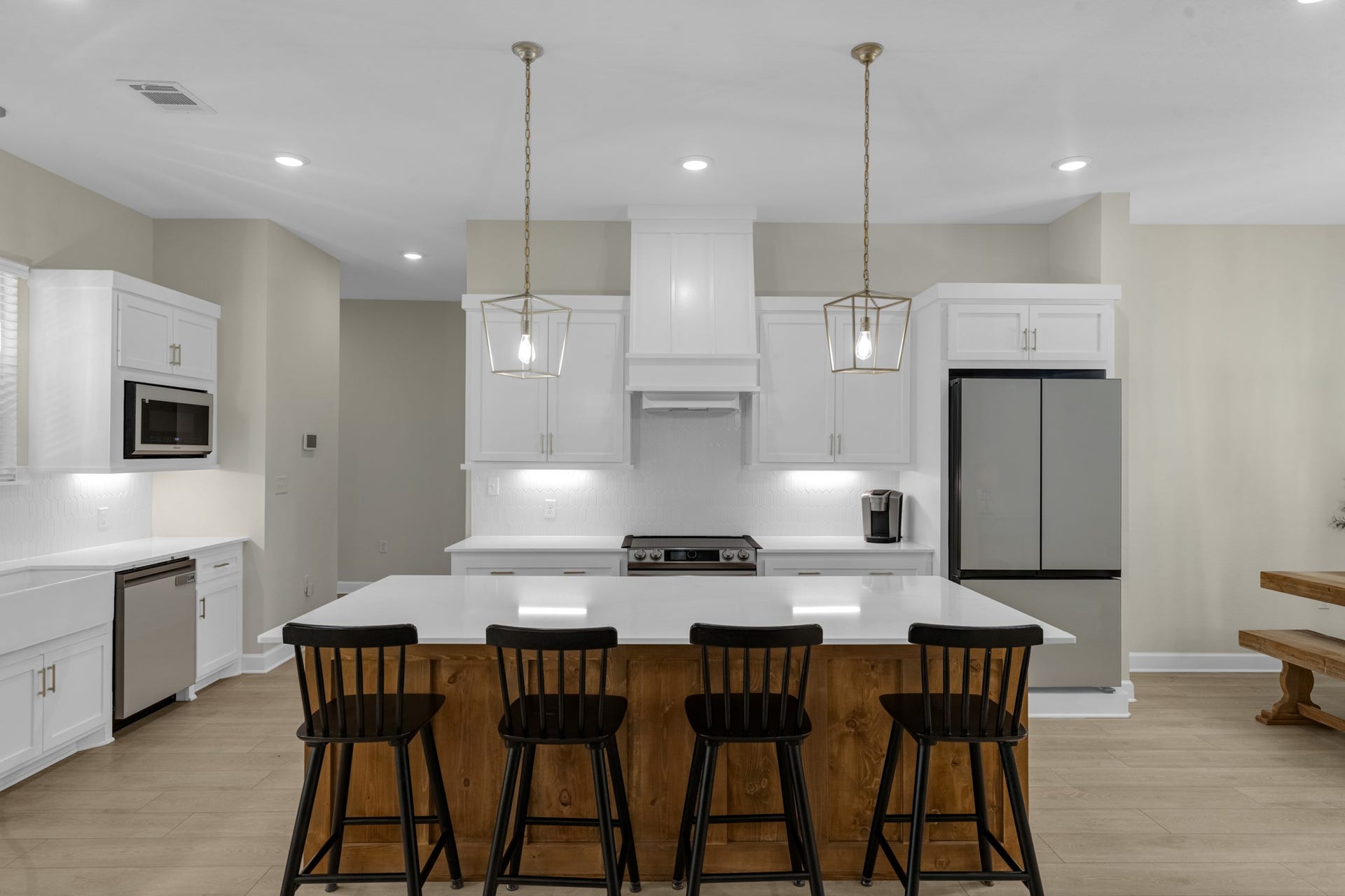 22694 Brook Forest Road, New Caney, TX 77357 Plenty of room to gather! Oversized island provides fantastic prep space, storage & seating.