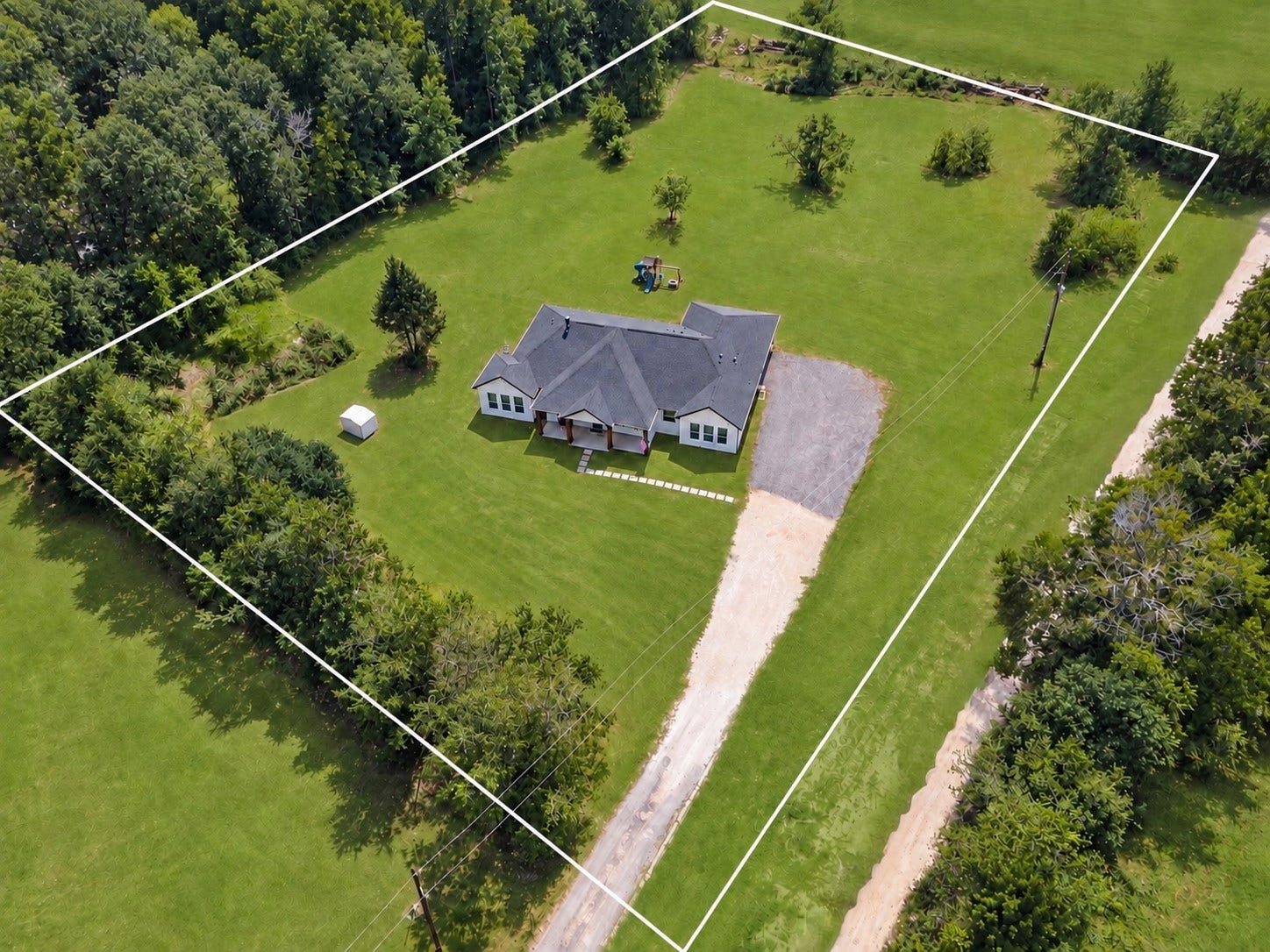 22694 Brook Forest Road, New Caney, TX 77357 NEARLY NEW on 2.67 ACRES! Stunning home tucked well back from the road!