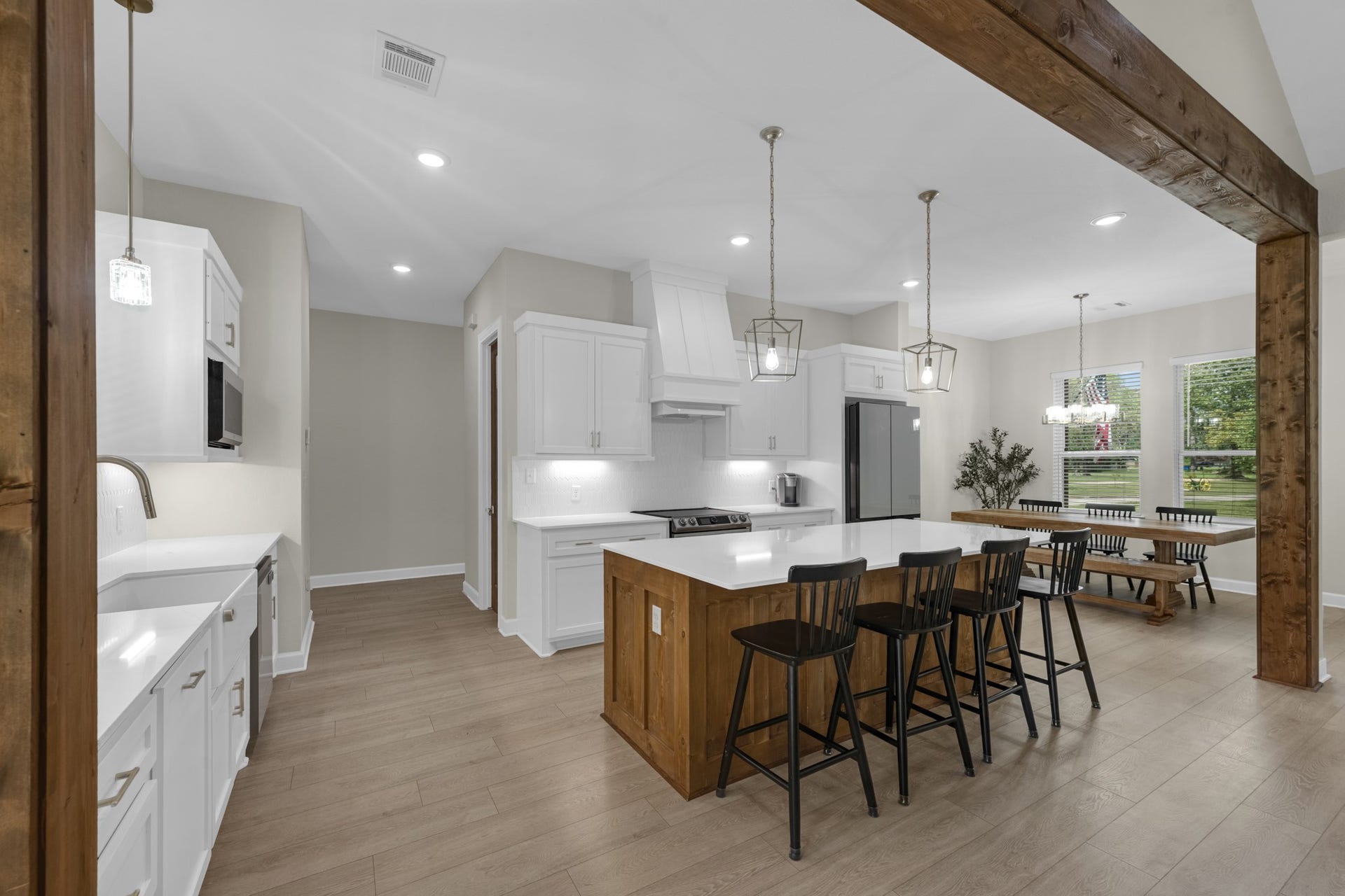 22694 Brook Forest Road, New Caney, TX 77357 Beautiful wood accents add warmth and character to this bright, open kitchen.
