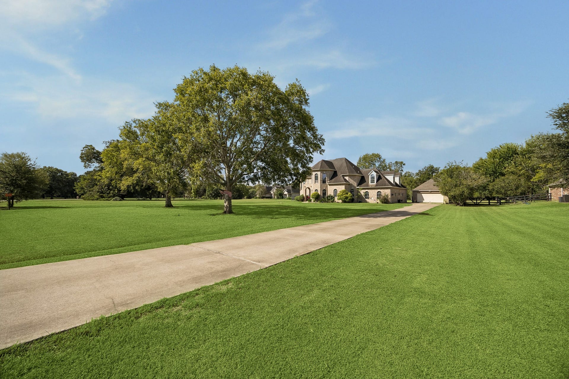 1319 Brazoswood Place, Richmond, TX 77406 Whats not to love about this stately property? As evening approaches, visiting deer add to the charma nature lovers dream.