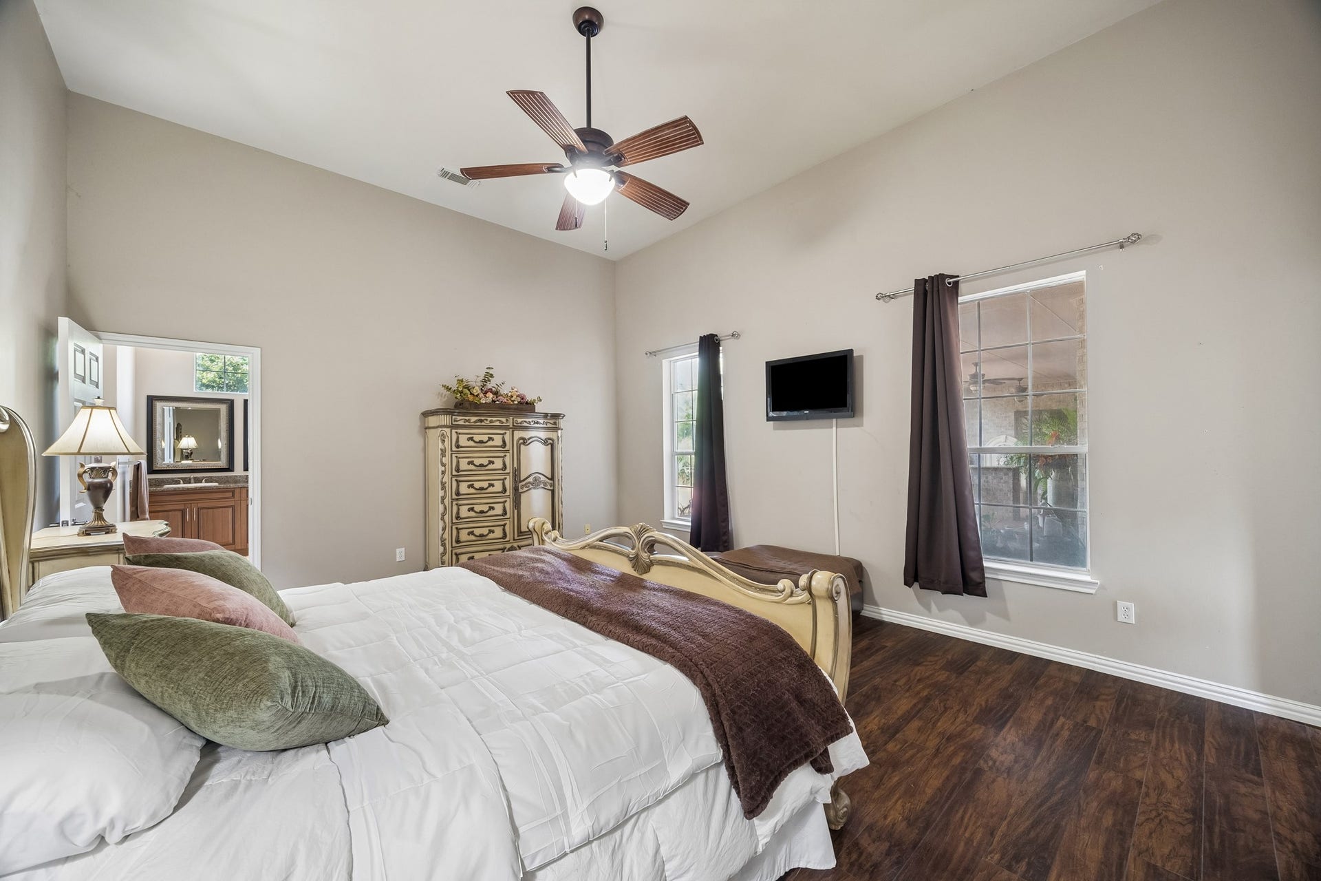 1319 Brazoswood Place, Richmond, TX 77406 Primary bedroom with back patio views