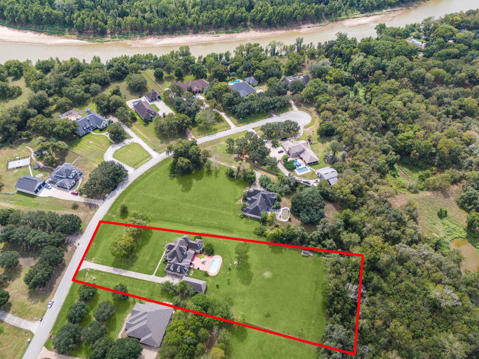 1319 Brazoswood Place, Richmond, TX 77406 This aerial view beautifully showcases the estates impressive stamp.