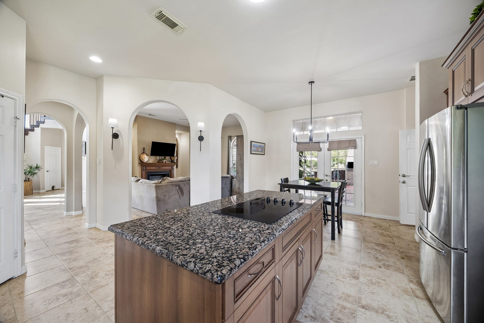 1319 Brazoswood Place, Richmond, TX 77406 Another view of the kitchen looking onto the living room, breakfast room and foyer just ahead.