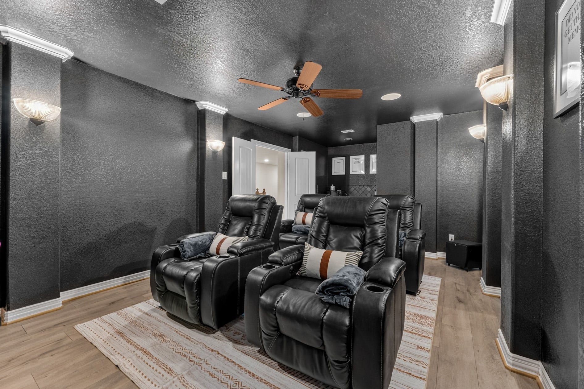 3 Blue Wildflower Pl, The Woodlands, TX 77354 The four movie room chairs and the large-screen TV can stay with the house!