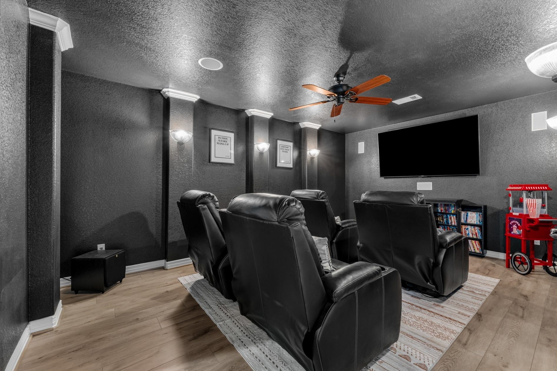 3 Blue Wildflower Pl, The Woodlands, TX 77354 Movie nights are a treat in this fantastic media room!