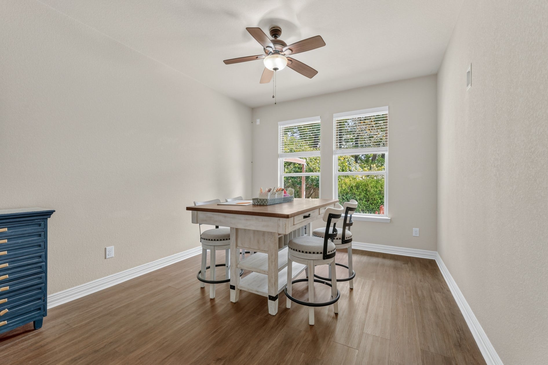3 Blue Wildflower Pl, The Woodlands, TX 77354 The third guest bedroom has a pretty view of the pool area and mature landscaping in the backyard. It is separated from the other two guest bedrooms and has a full bathroom next to it - perfect for offering more privacy for guests.