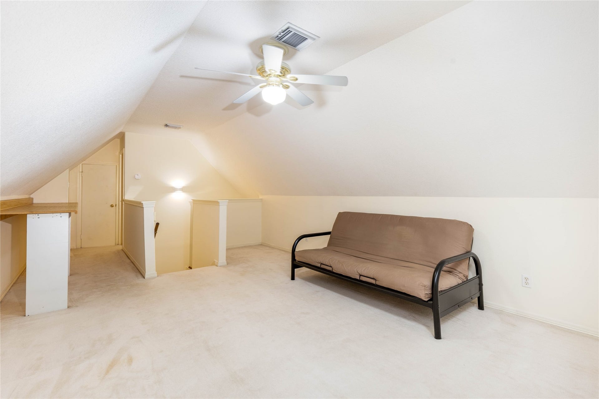 Another view of the upstairs game room (or bedroom), which also features a full bath and closet!