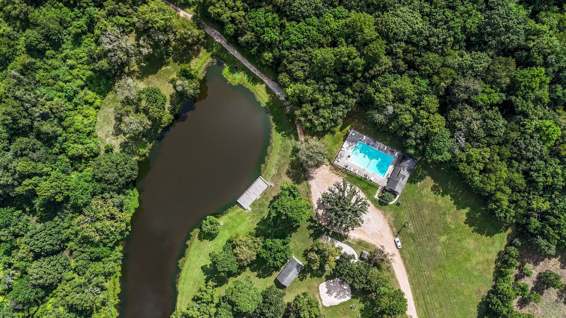 Here is a wider view of the pool, lake and playscape/pavilion area!
