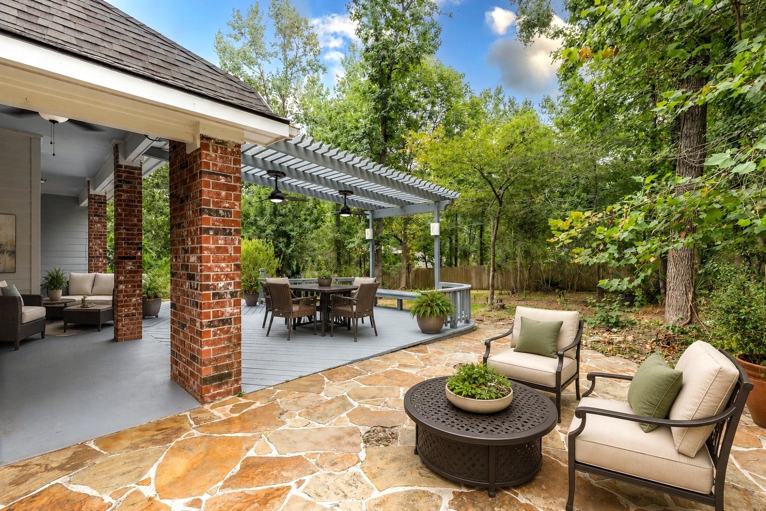 Need more space out back...you got it! Check out the flagstone patio next to the deck! And there is a flagstone walkway from this patio all the way to the front!!! Digitally Staged