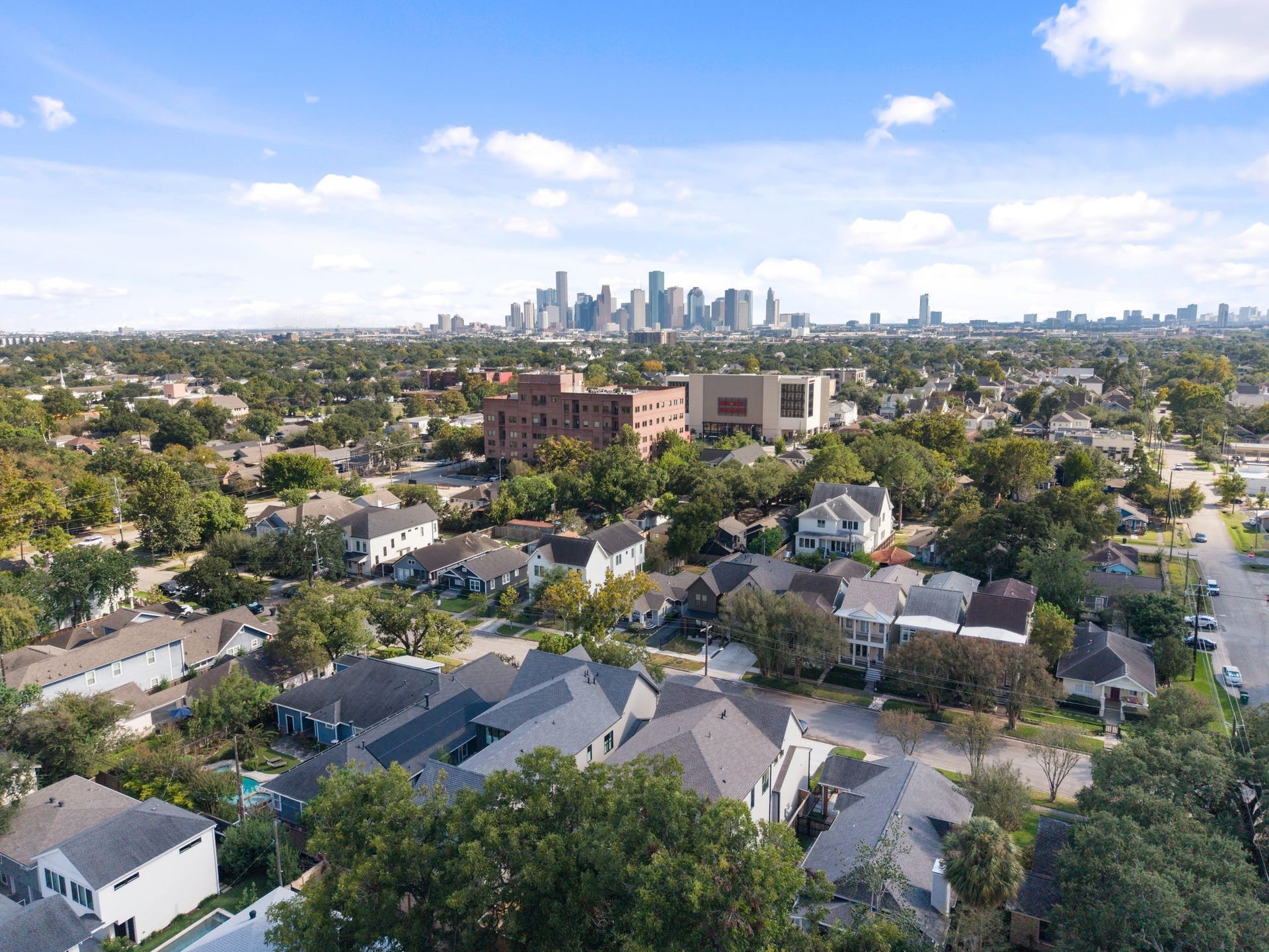 711 E 12th Street, Houston, TX 77008 A neighborhood perspective captures the appeal of Heights living: tree-lined streets, distinctive homes, and Houstons skyline on the horizon. At 711 E 12th, neighborhood charm and city connection come together.