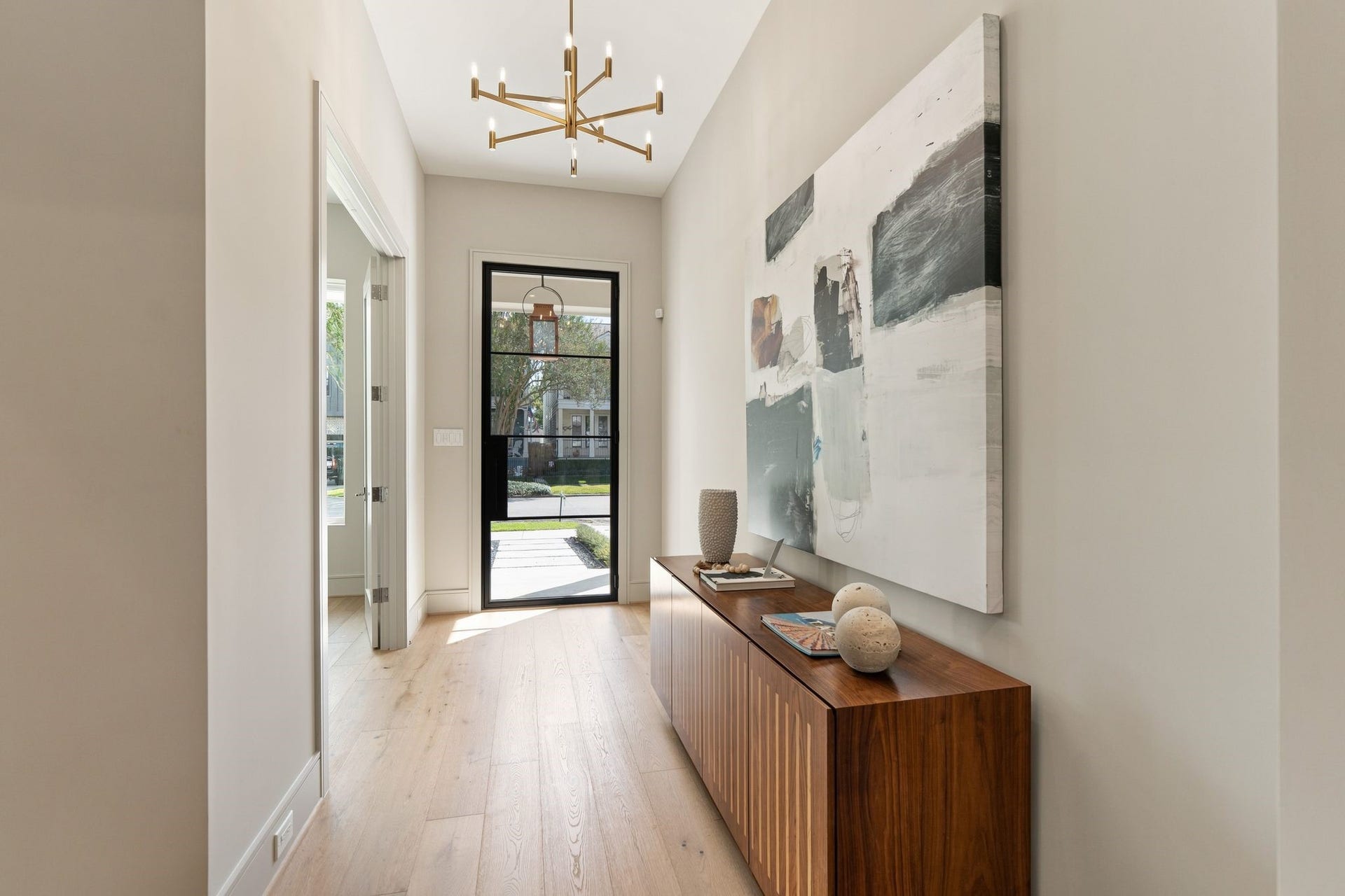 711 E 12th Street, Houston, TX 77008 Double doors connect the entry to the study, allowing it to feel open and welcoming or close off for privacy.