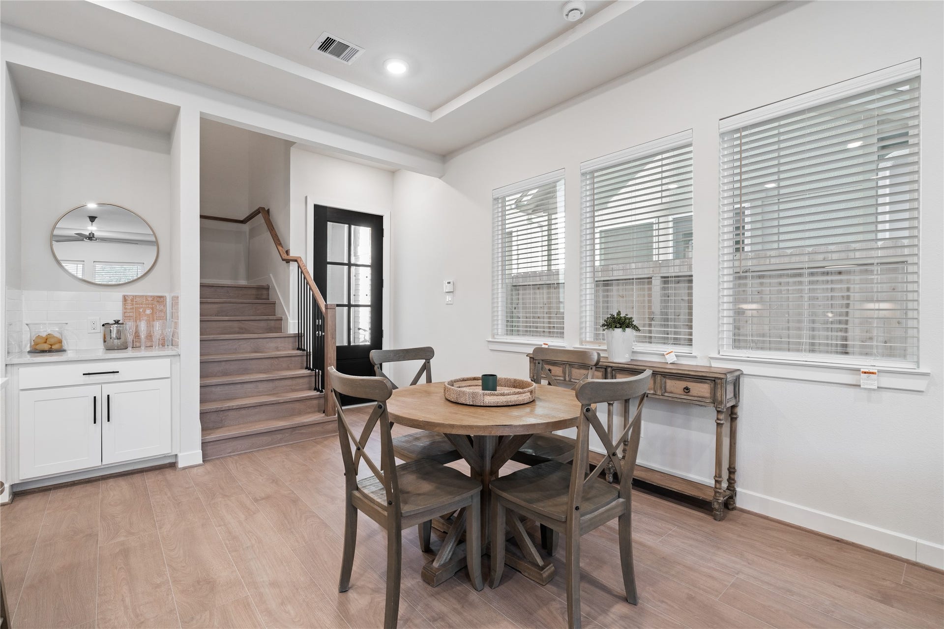 6509 Rena Street, Houston, TX 77092 Defined dining area positioned between the living and kitchen, with a built in dry bar that adds practical storage and counter space.