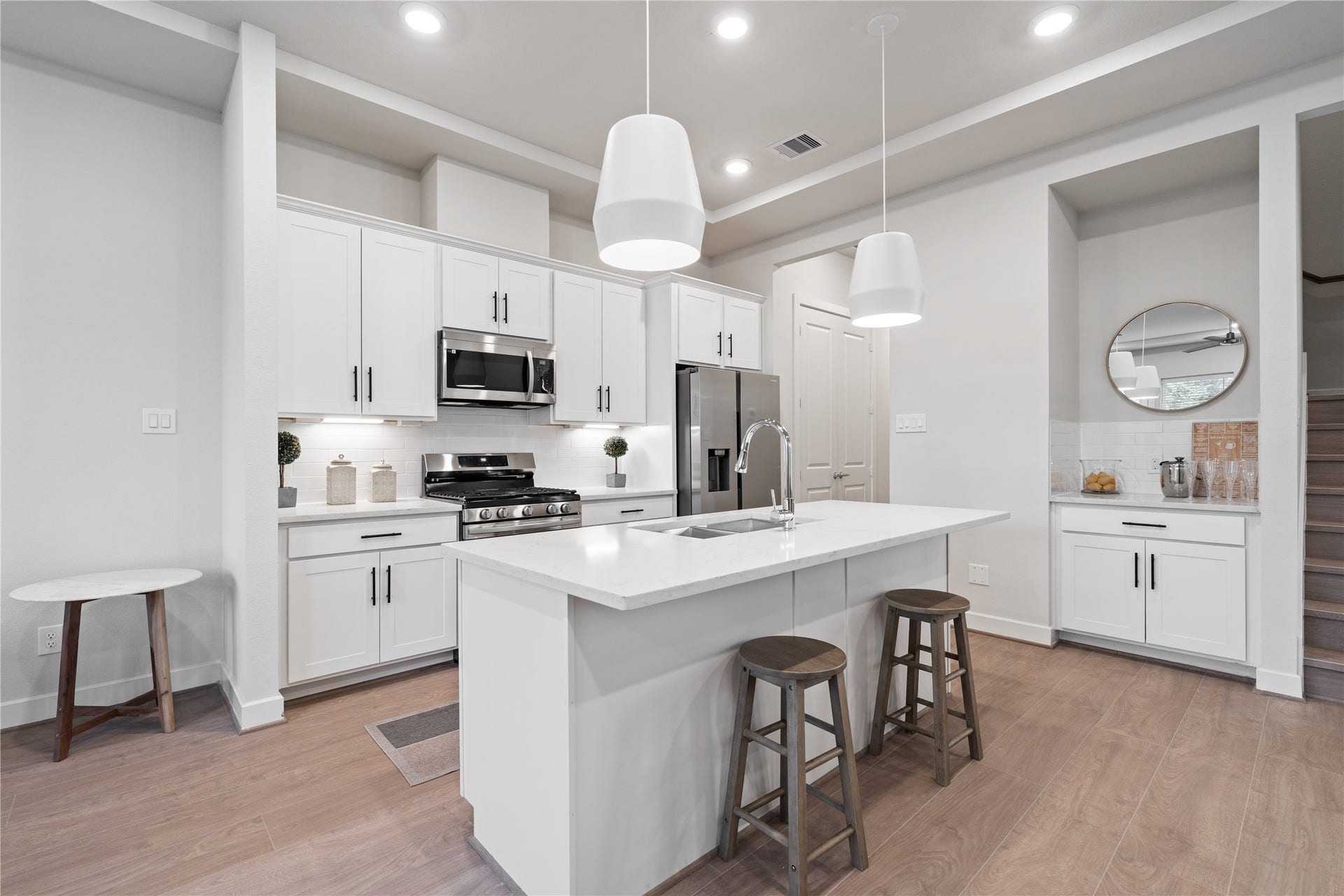 6509 Rena Street, Houston, TX 77092 Clean white cabinetry and stainless appliances keep the look bright and easy to maintain.