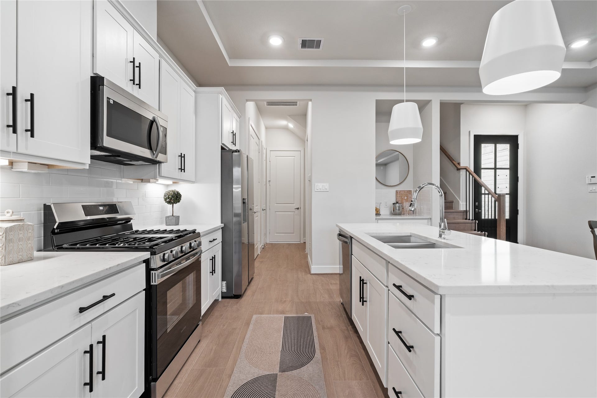 6509 Rena Street, Houston, TX 77092 Smart layout with generous prep space and clear sightlines that make the entire first floor feel connected.