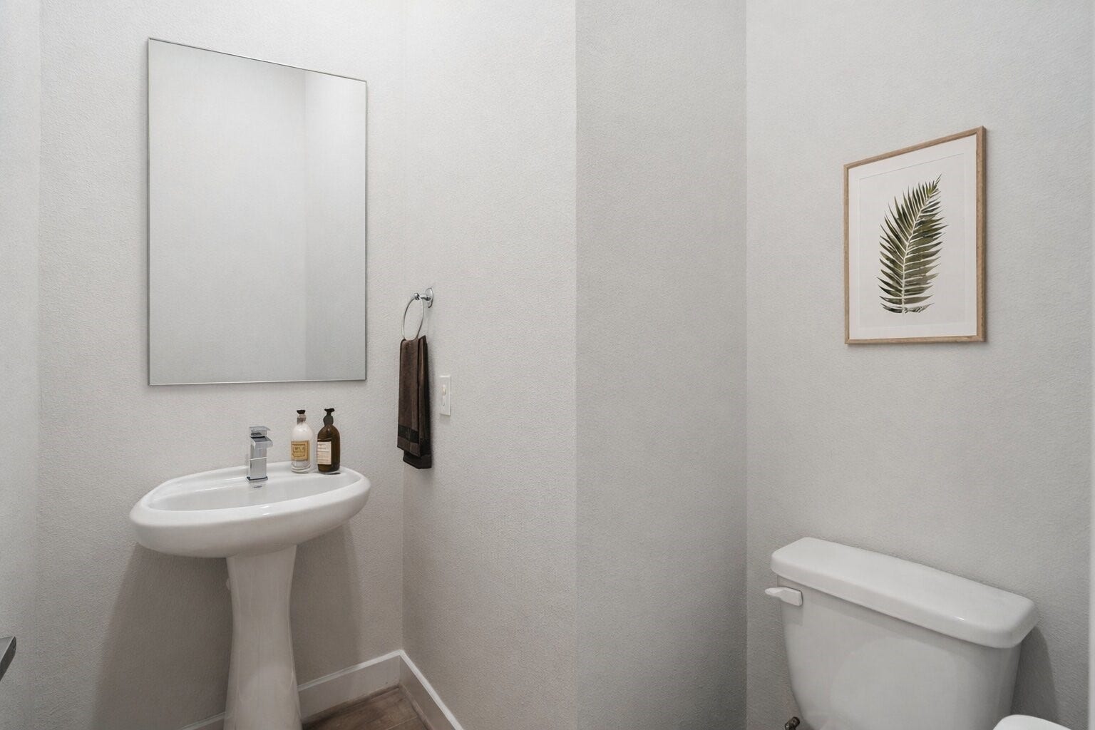 6509 Rena Street, Houston, TX 77092 Main floor powder bath finished with a pedestal sink and straightforward, low maintenance design.