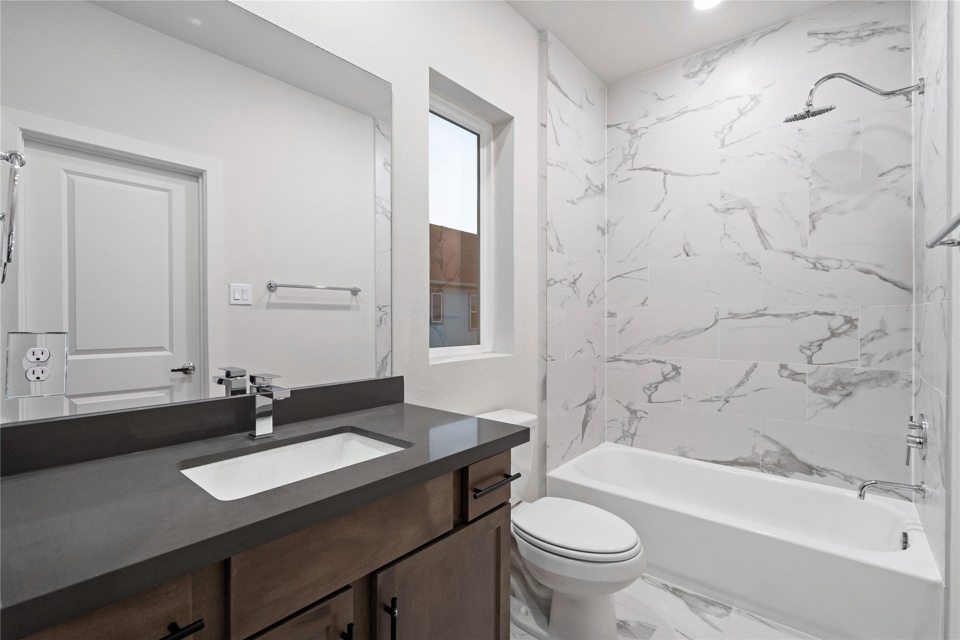 6509 Rena Street, Houston, TX 77092 Alternate bathroom color palette displayed here reflects the selection options available, allowing buyers to choose a style that fits their preference.