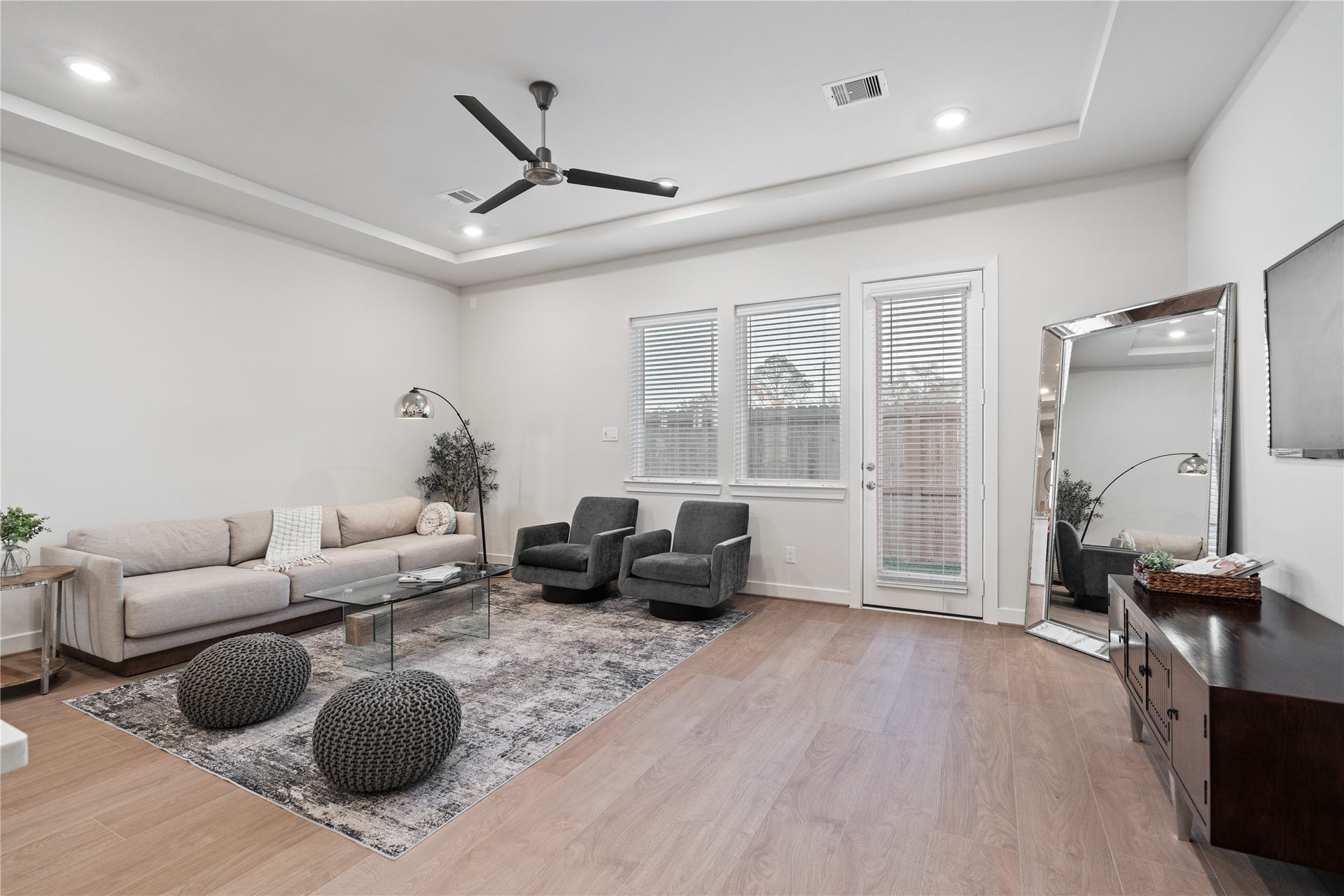 6509 Rena Street, Houston, TX 77092 Large rear windows keep the room bright while maintaining a clean, uncluttered wall line.