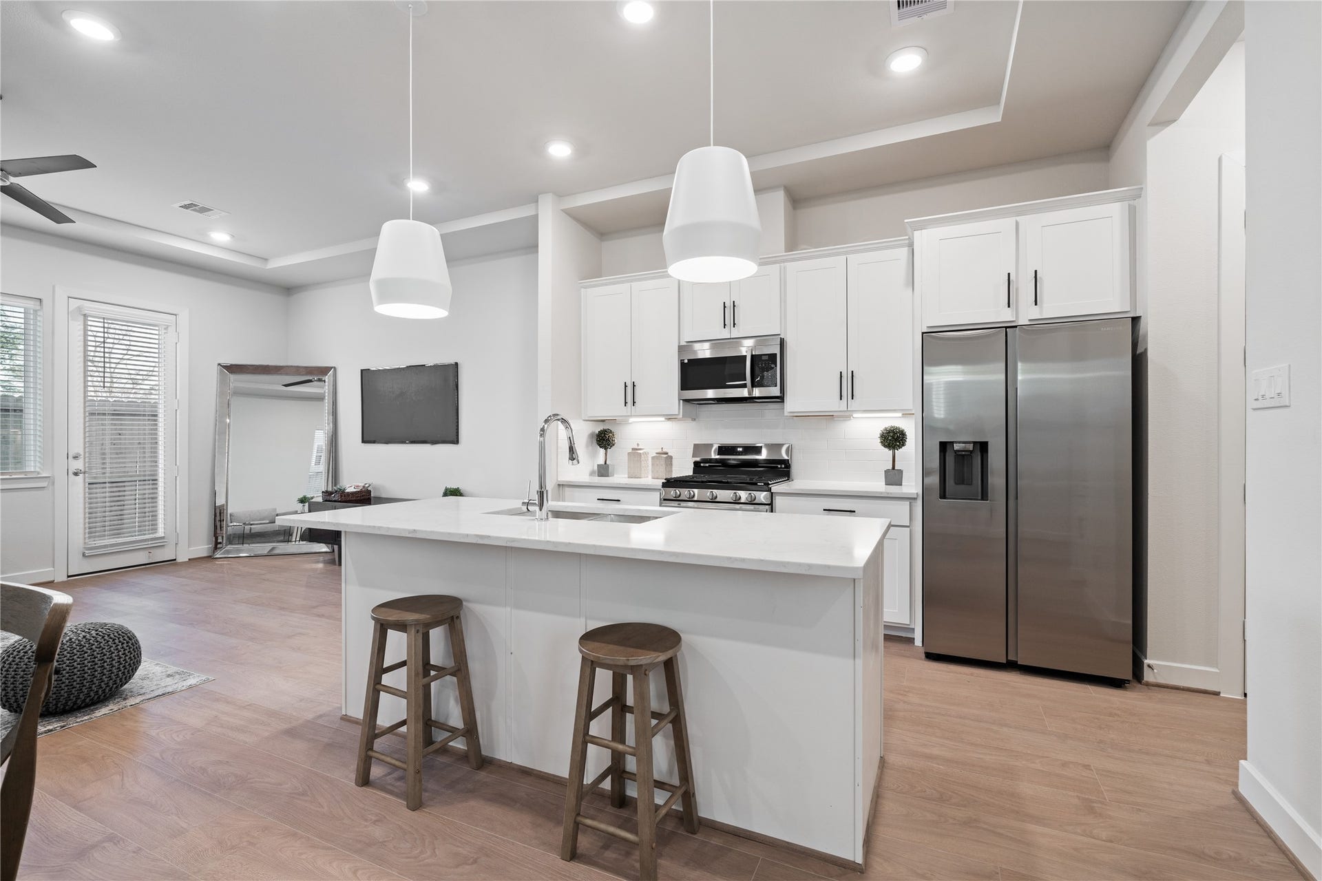 6509 Rena Street, Houston, TX 77092 A central island with seating anchors the kitchen and supports both quick mornings and casual hosting.