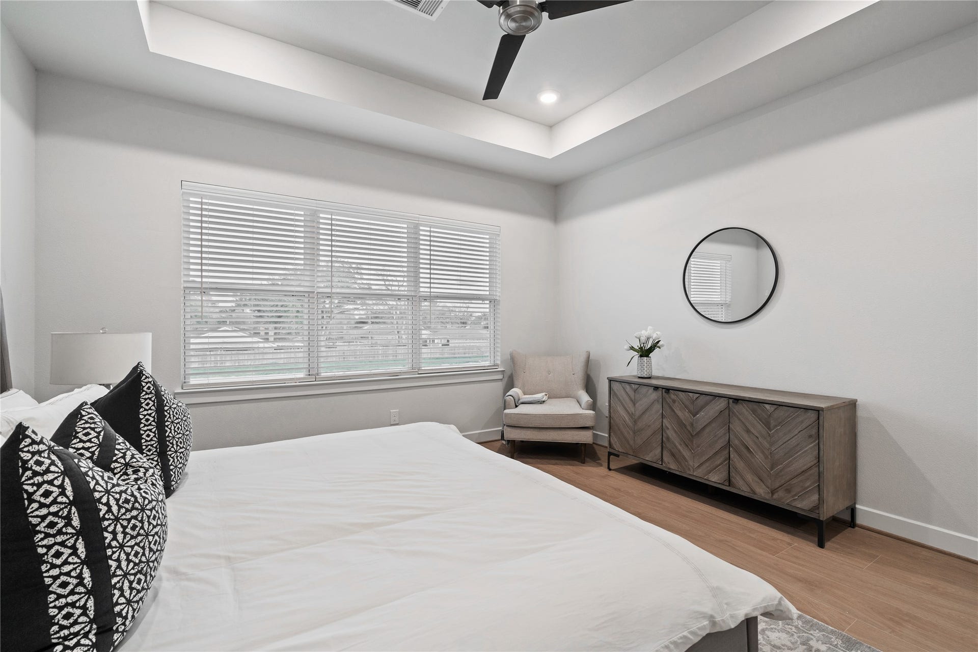 6509 Rena Street, Houston, TX 77092 Generously sized primary suite with clean wall lines and a wide rear window that brings in steady natural light, keeping the space open and relaxed without feeling crowded.