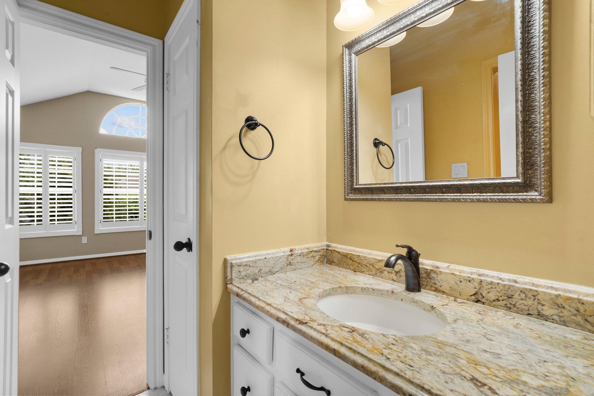 23 Saint Simons Court, Sugar Land, TX 77479 Featuring a walk-in shower and linen closet, this bathroom is conveniently accessible from both the game room and an adjacent bedroom.