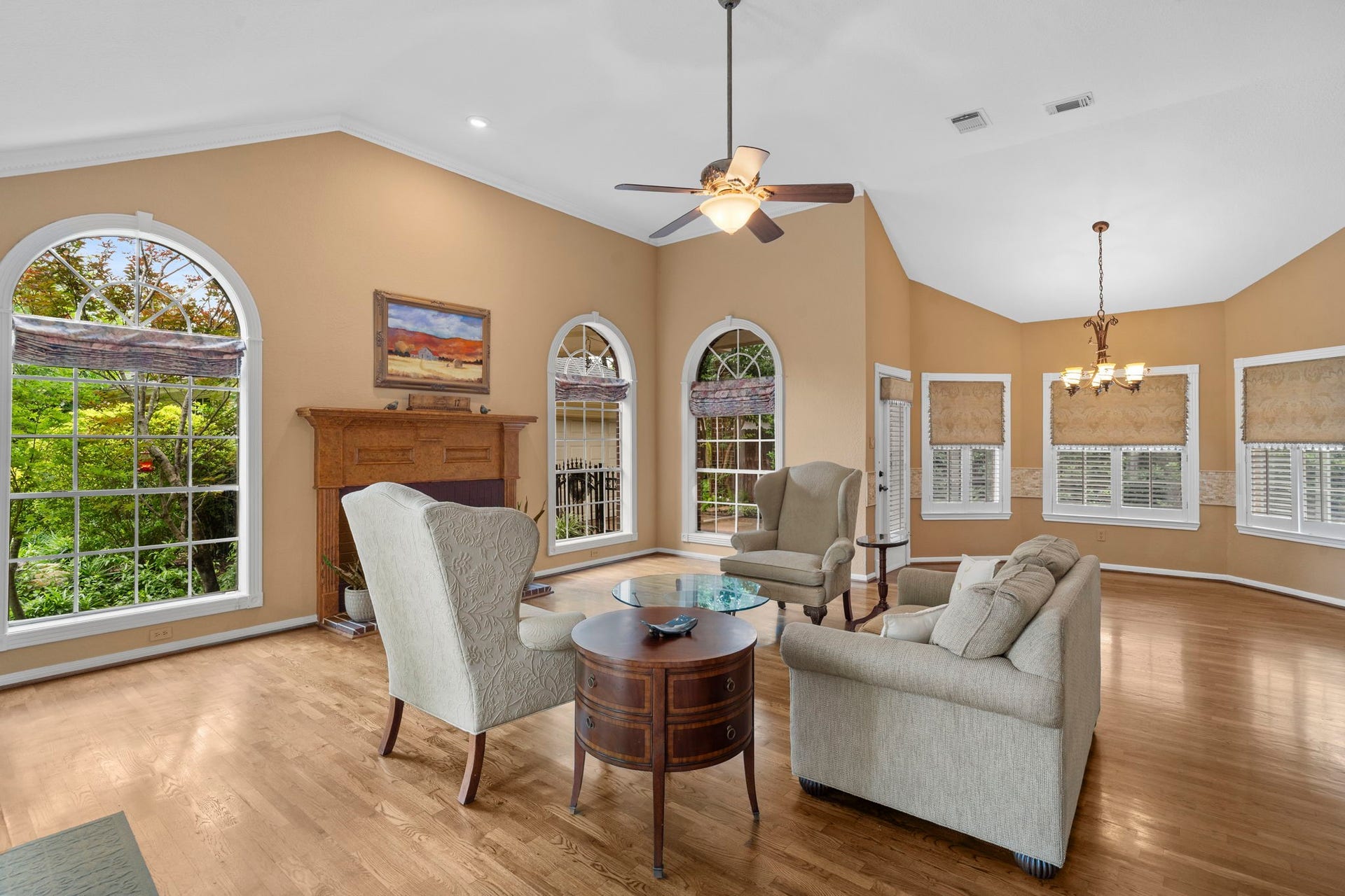 23 Saint Simons Court, Sugar Land, TX 77479 Large windows fill the family room with natural light, complementing the open and inviting space.