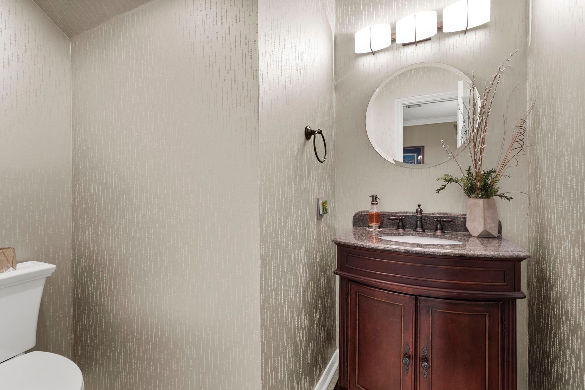 23 Saint Simons Court, Sugar Land, TX 77479 This inviting first-floor powder room is ideally situated near the homes main living areas.